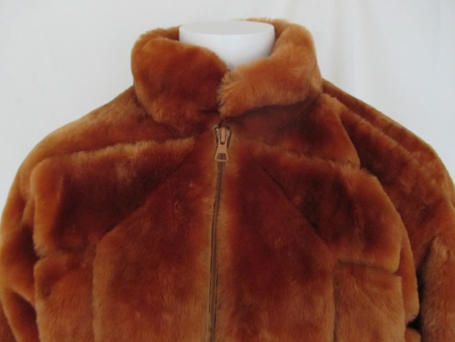 Rare 1980's Christian Dior Fur Bomber Jacket is made of soft sheared beaver fur with leather panels. 

We offer more luxury fur items, view our frontstore.

Details:
It has a stand-up collar, 2 pockets, long wide sleeves, ribbed wool at hem and