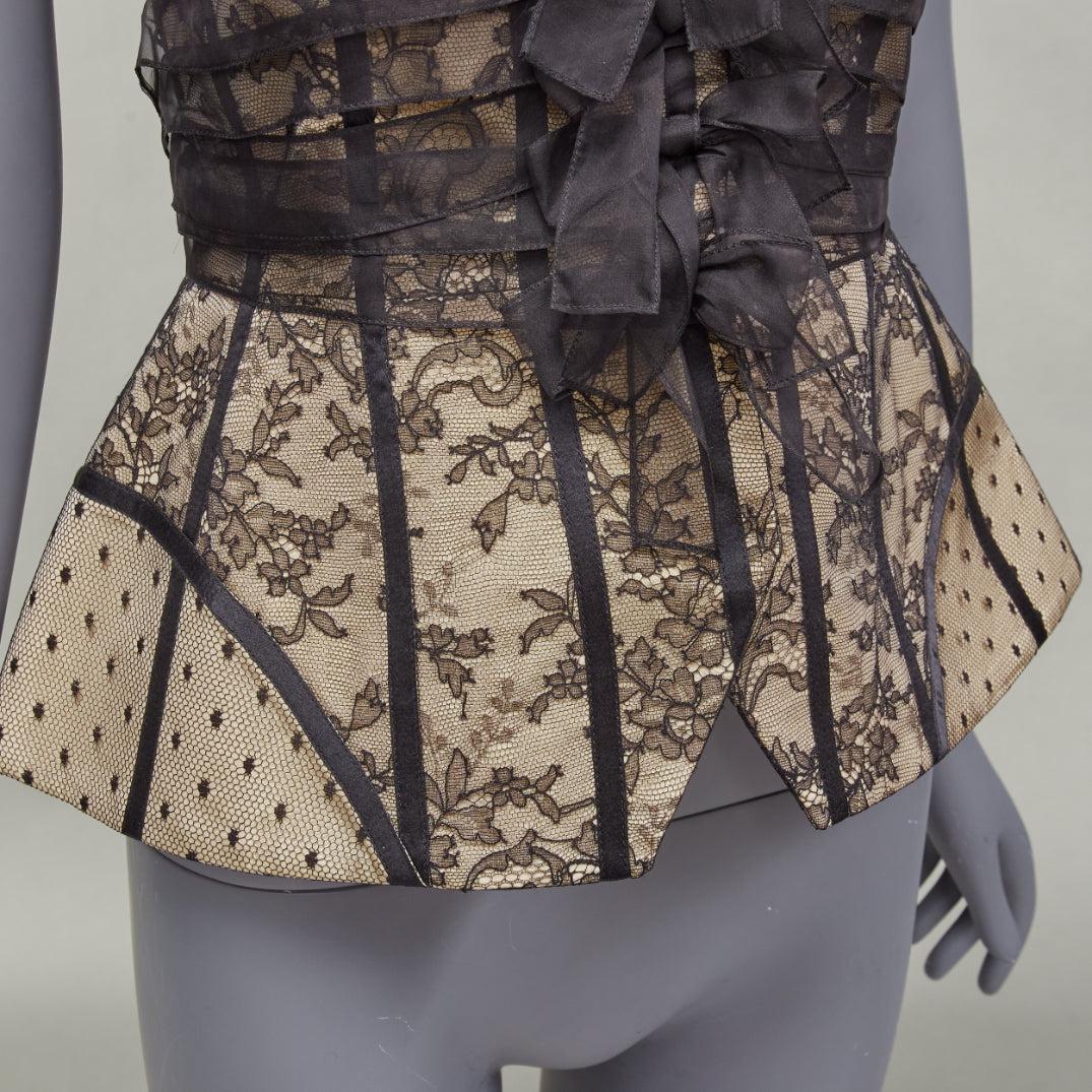 CHRISTIAN DIOR Galliano 2010 Runway beige black silk sheer lingerie bustier top FR38 M
Reference: LNKO/A02264
Brand: Dior
Designer: John Galliano
Collection: SS 2010 - Runway
Material: Silk
Color: Nude, Black
Pattern: Lace
Closure: Snap