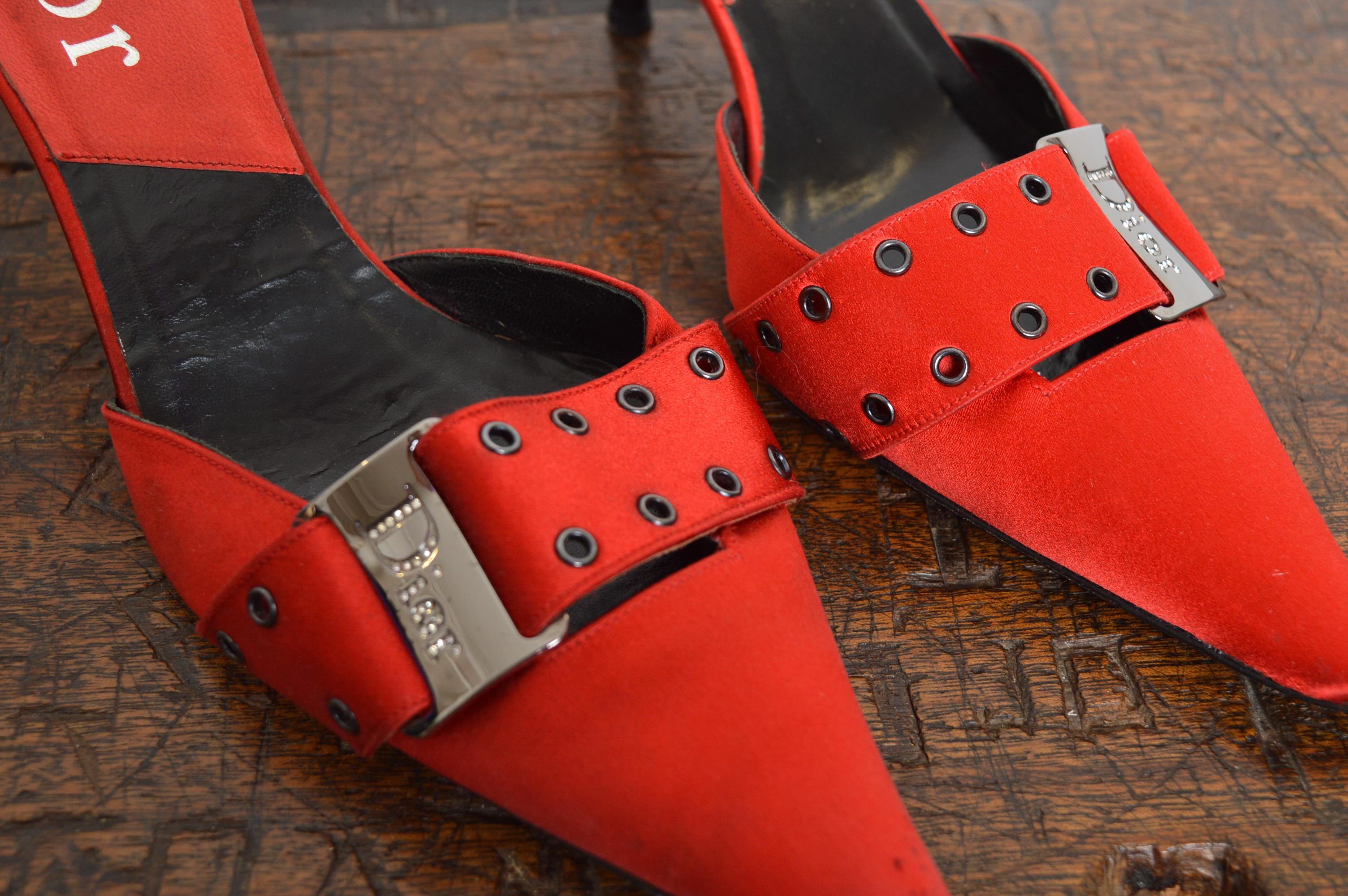 Fabulous 2000’s Christian Dior by John Galliano Ruby red satin pointed Kitten Heels featuring Swarovski encrusted Dior Buckles with gun metal rivets and 3” Heels.
Size; UK 5.5 / EU 38.5
Heel Height; 3” inches.
Condition; Good Condition despite Minor