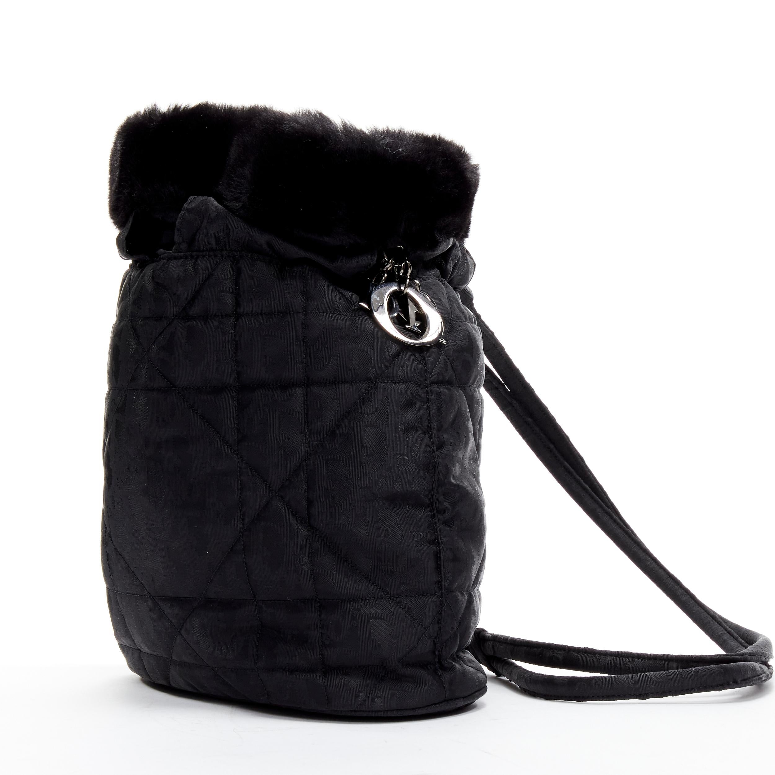 CHRISTIAN DIOR Galliano Vintage black CD charm faux fur Cannage sling backpack
Reference: TGAS/C01702
Brand: Christian Dior
Designer: John Galliano
Collection: Cannage
Material: Feels like polyester
Color: Black, Silver
Pattern: Solid
Closure: