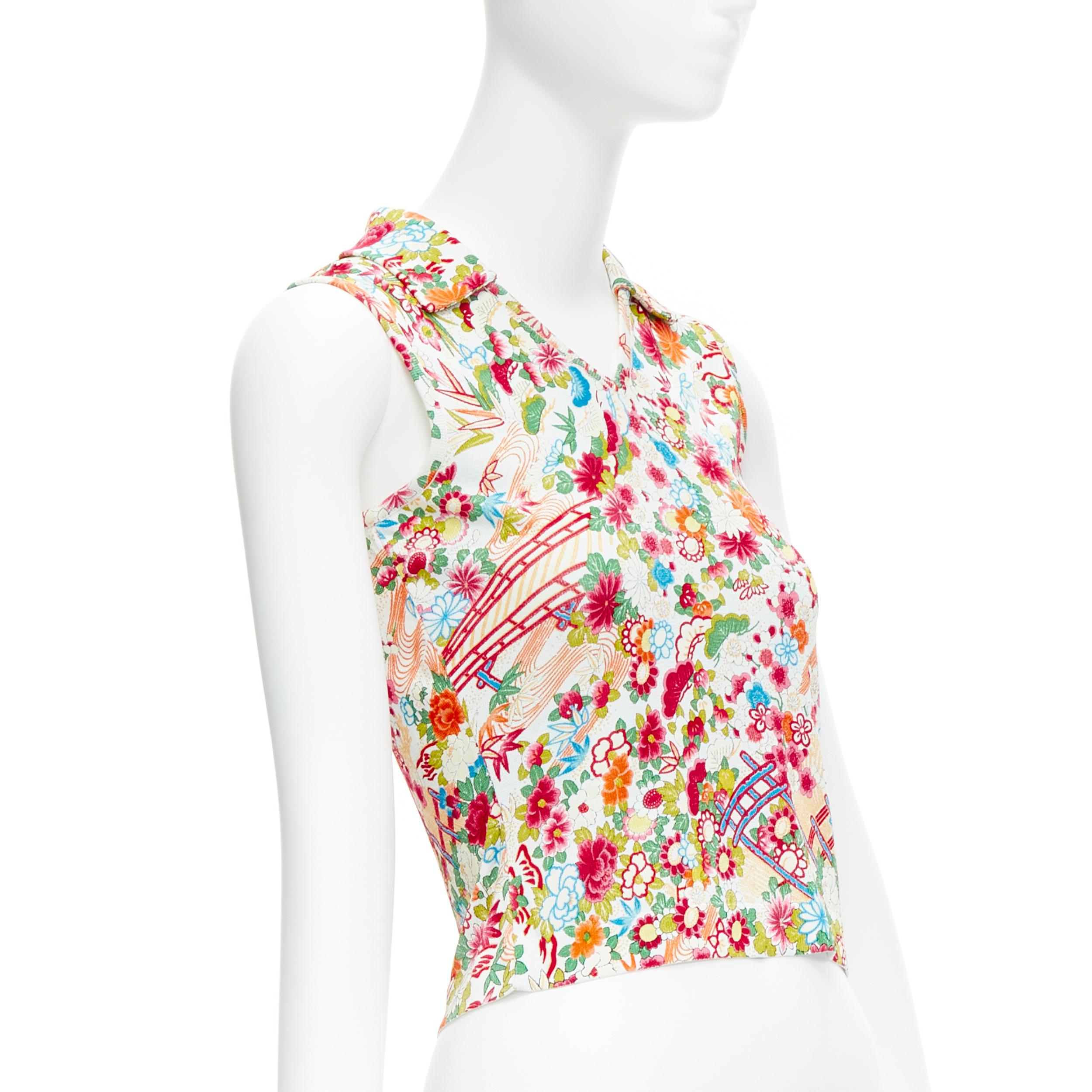 CHRISTIAN DIOR Galliano Vintage floral bridge print cropped top FR38 M
Reference: TGAS/C02022
Brand: Christian Dior
Designer: John Galliano
Material: Polyamide
Color: Multicolour
Pattern: Floral
Closure: Pullover
Made in: