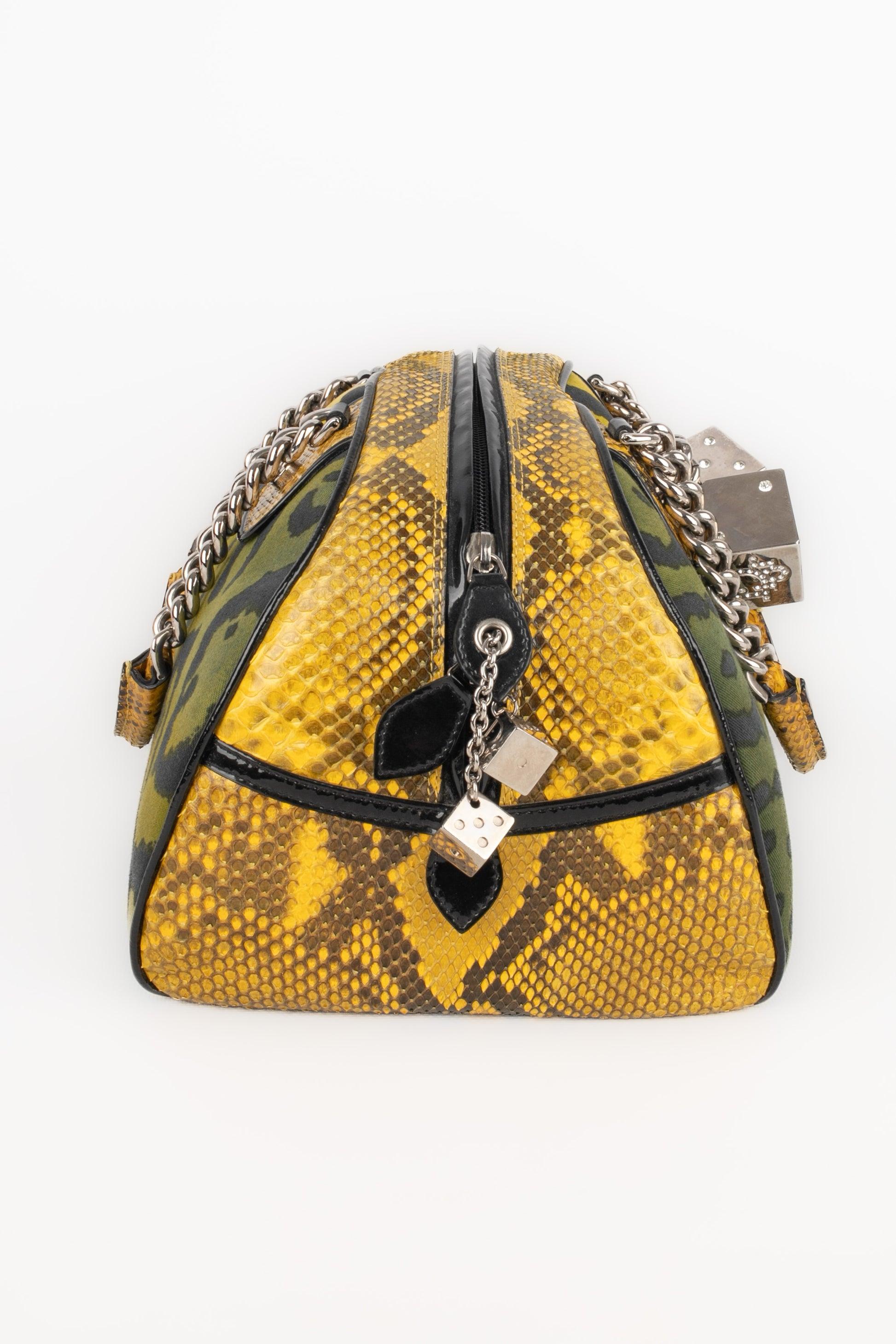 Dior - (Made in Italy) Green shading printed canvas 'Gambler Dice' bag with an animal print and with shiny exotic leather. Rhinestoned dices patterns on the zipper and the double chain handle. Limited edition, 2004 Fall-Winter Collection, under the