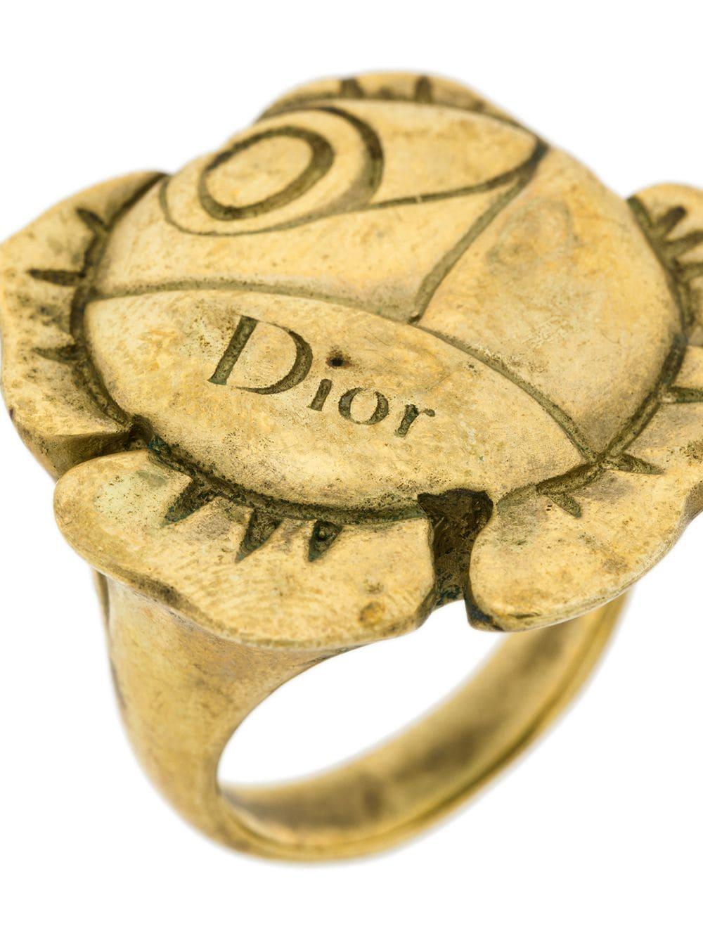 Christian Dior gold-tone metal flower ring featuring a flower shape and a Dior logo at the top. 
In good vintage condition  Made in France. 
Ring Size: 54 EU
Diameter: 2in. (5.5cm)
We guarantee you will receive this gorgeous item as described and