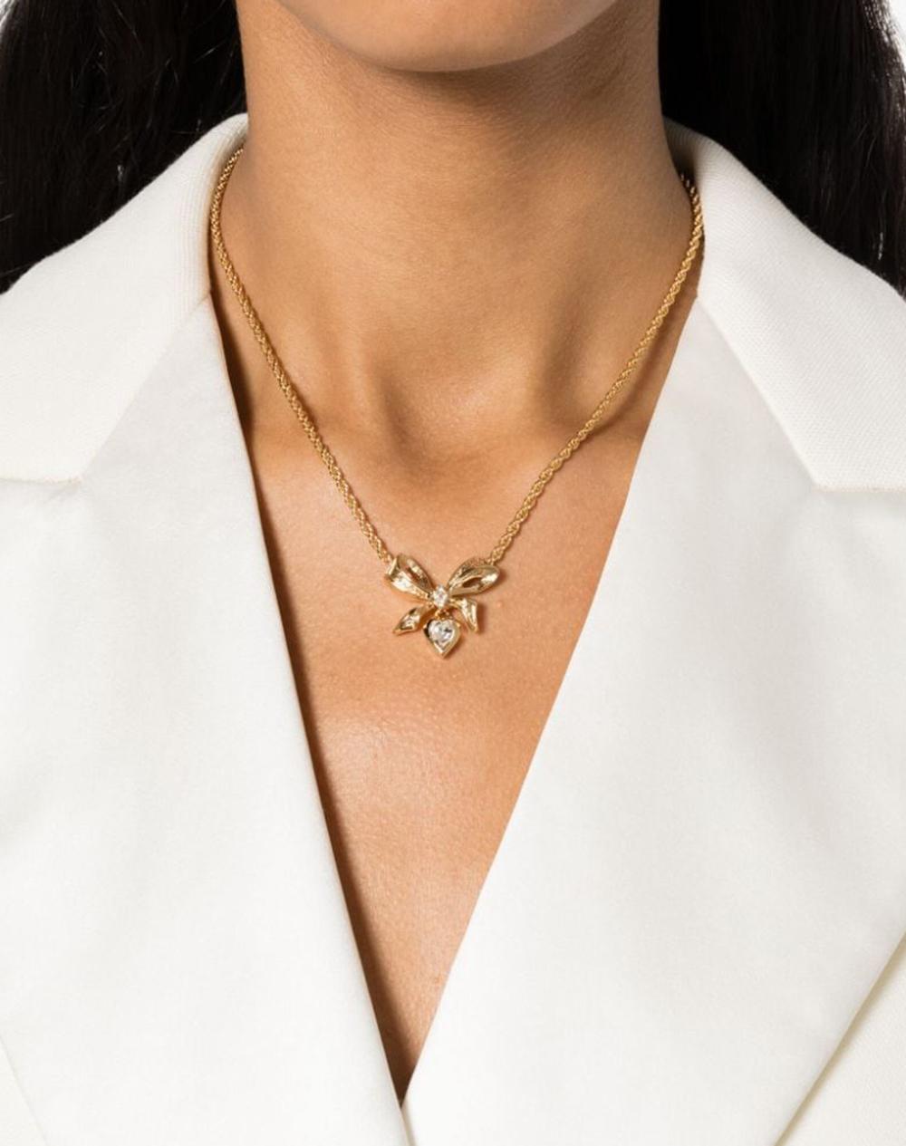 Christian Dior Goldfarbene Schleifen-Anhänger-Halskette Damen im Angebot
