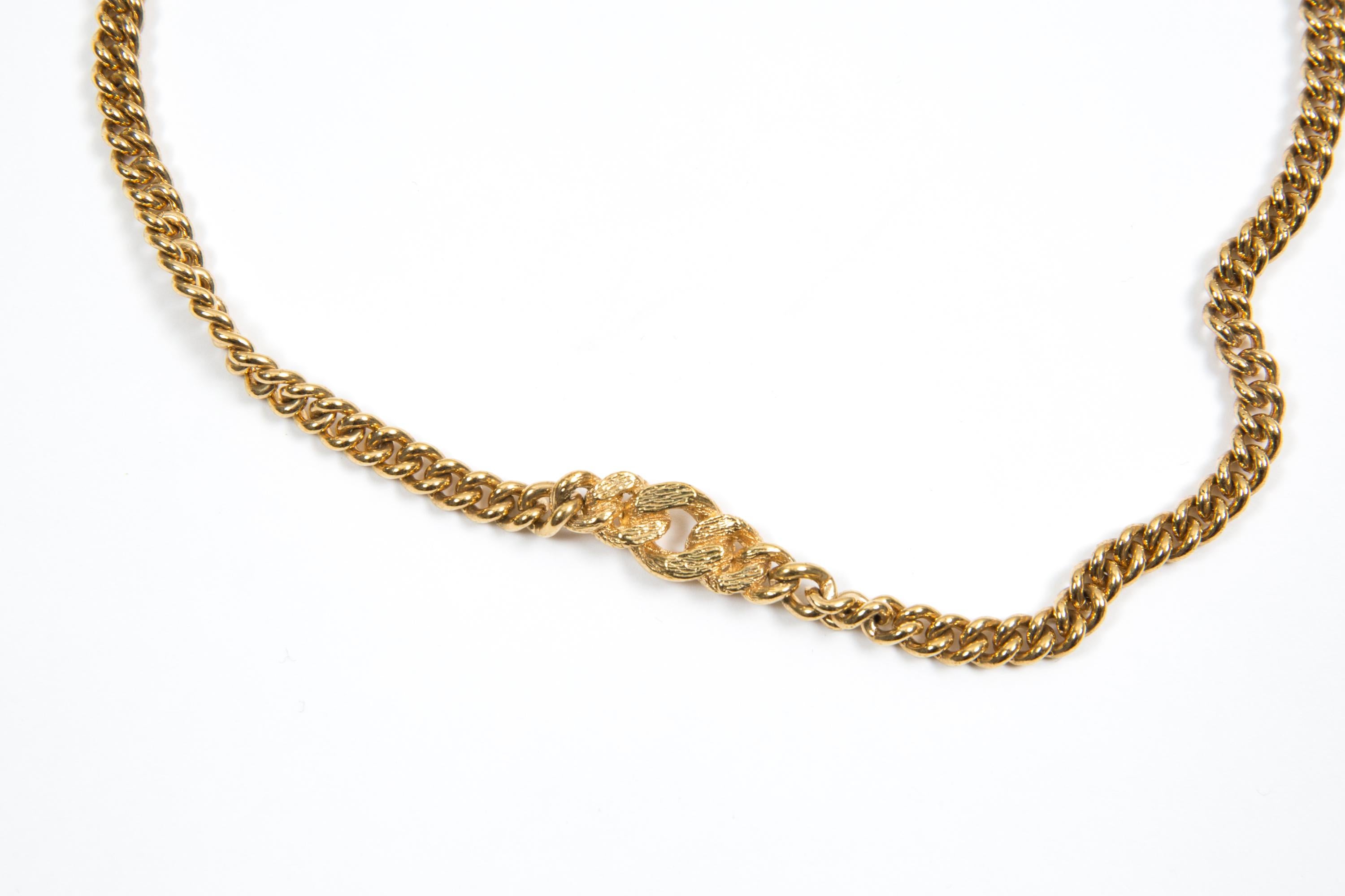 Christian Dior Gold-tone cable necklace featuring a center large cable part, a logo CD fastening. 
Length: 15.3in. (39cm)
Circa: 1990s
In good vintage condition. Made in France.
We guarantee you will receive this  iconic item as described and showed