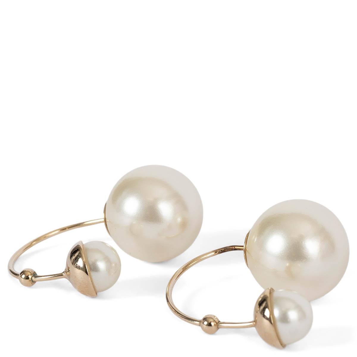 100% authentic Christian Dior Ultradior earrings in gold-tone metal with small and large faux pearl. Have been worn and are in excellent condition. 

All our listings include only the listed item unless otherwise specified in the description above