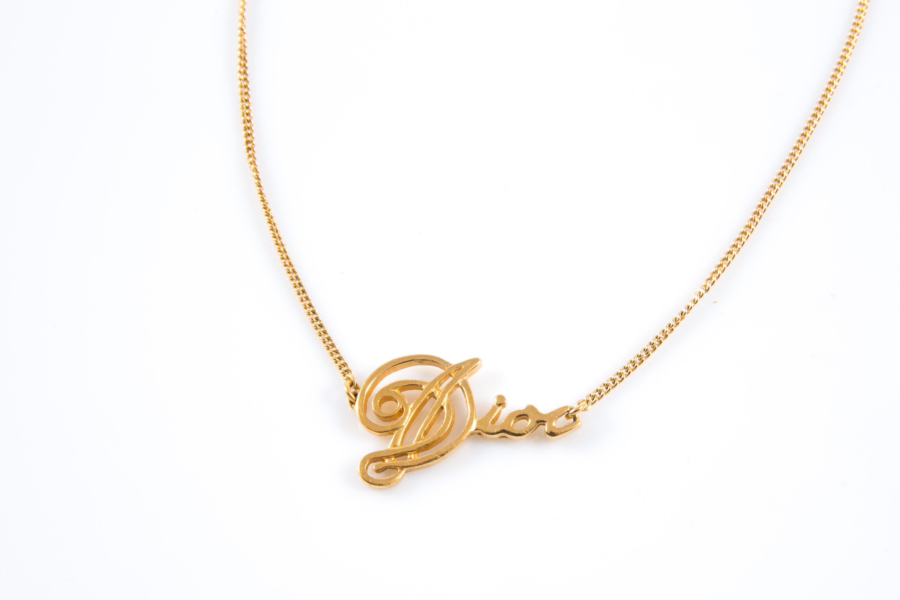 Christian Dior gold-tone “Dior” chain necklace featuring a large front “Dior” a thin chain and a back” CD” free. 
In good vintage condition. Made in France.
Circa: 2000s
Maxi Length: 18.3in. (46.5cm)
We guarantee you will receive this  iconic item
