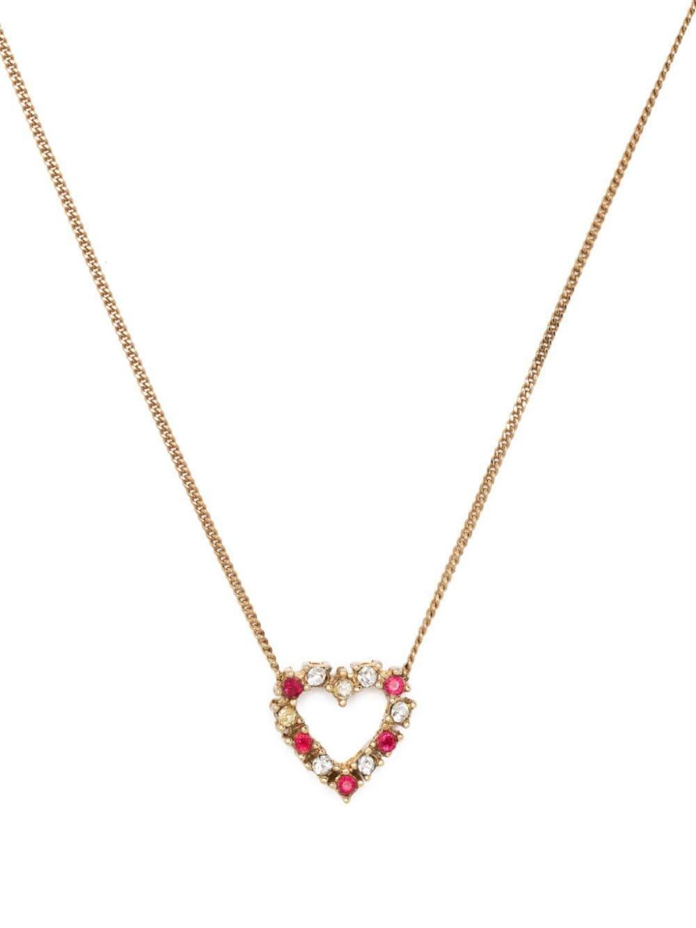 Dior rhinestone-embellished heart-charm necklace featuring heart charm, white and red rhinestone embellishment, small logo charm, thin chain, adjustable fit, spring-ring fastening.
Length: 16.9in (43cm)
Pendant Length: 0.5in (1.3cm)
Circa: 1990s
In
