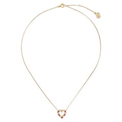 Christian Dior - Collier en forme de cœur en métal doré