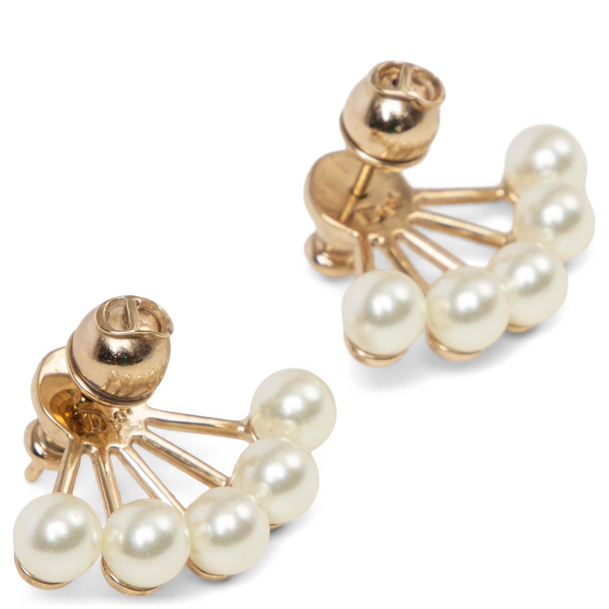 100% authentic Christian Dior 'La Petite Tribale' stud earrings in gold-tone metal with faux pearls. Have been worn and are in excellent condition.

Measurements
Width	2.5cm (1in)
Height	0.7cm (0.3in)

All our listings include only the listed item