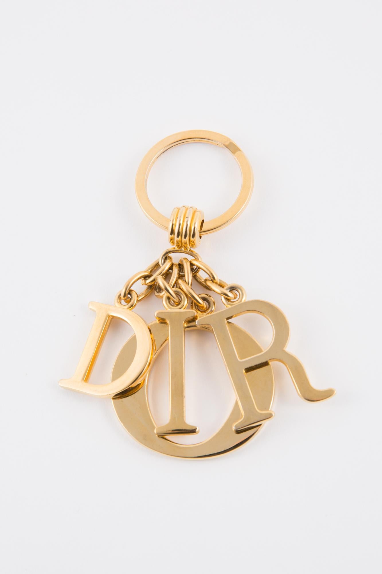 Christian Dior key ring or bag accessory featuring gold tone free letters. Delivered in original box.
In good vintage condition  Made in France. 
Maxi Length: 3.9in (10cm)
Ring Diameter:1.18in. (3cm) 
We guarantee you will receive this gorgeous item