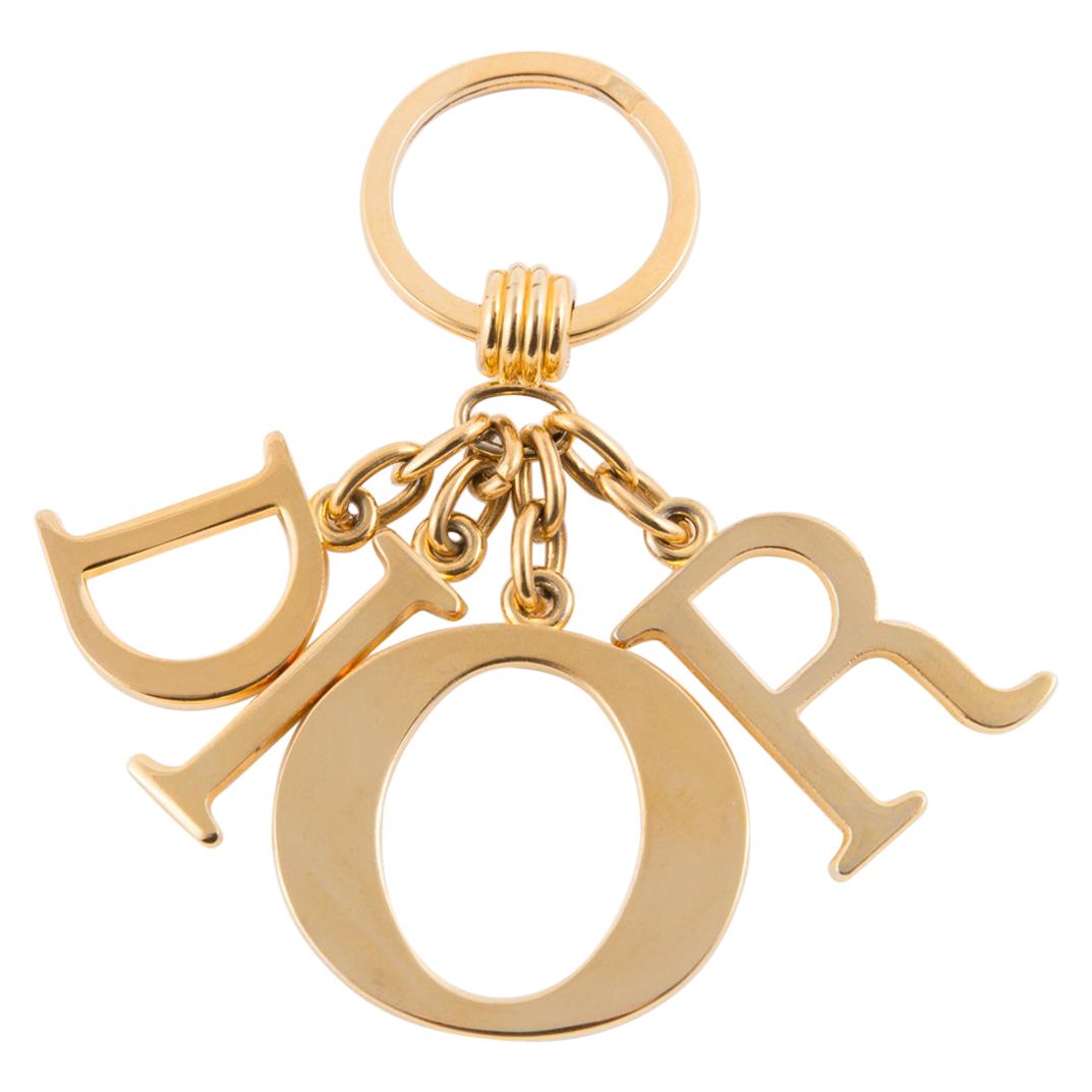 Christian Dior Porte-clés à breloques lettres en métal doré sur 1stDibs |  porte-cles dior
