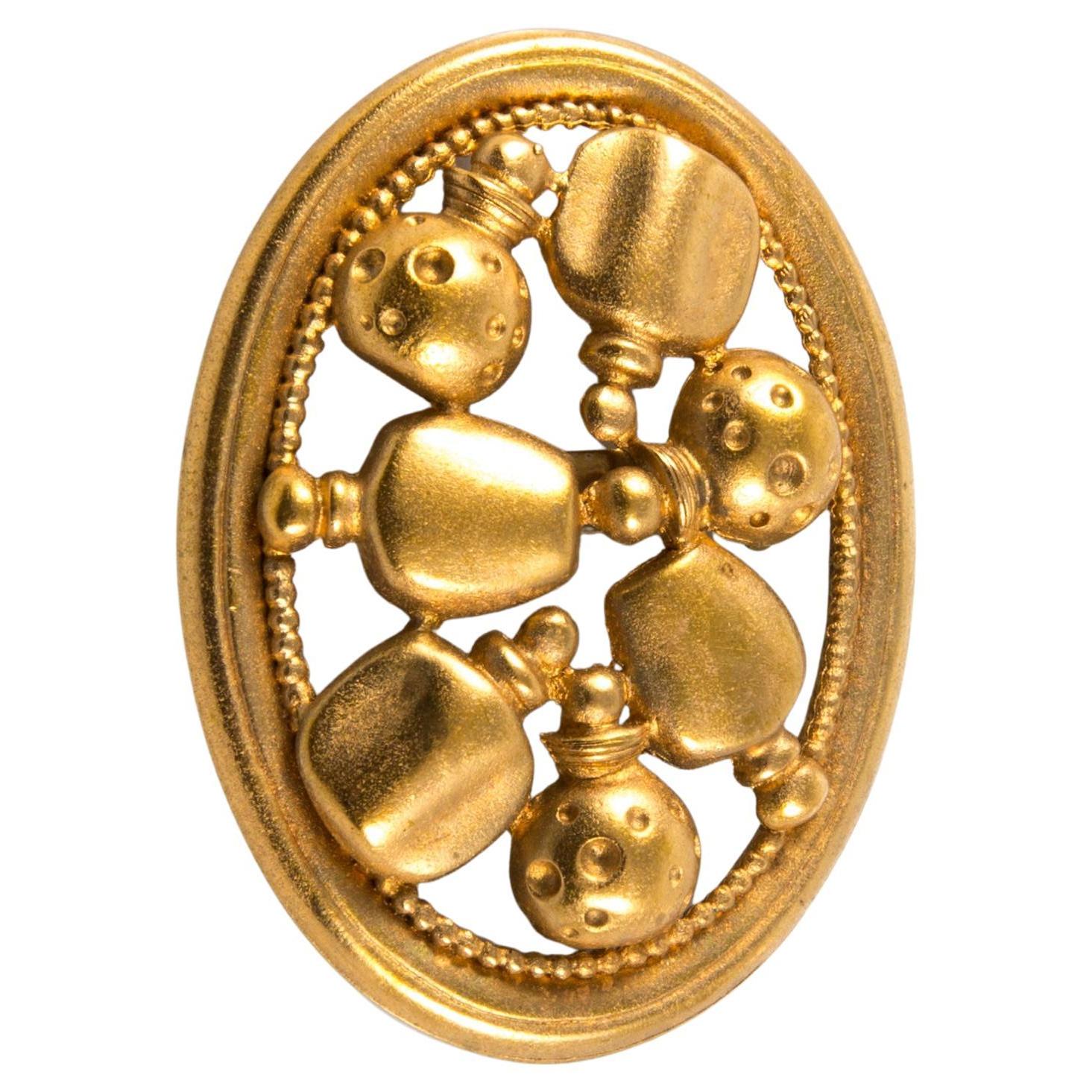 Broche flacons de parfum Christian Dior en or