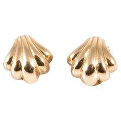 Orecchini a clip con conchiglia in tonalità oro di Christian Dior