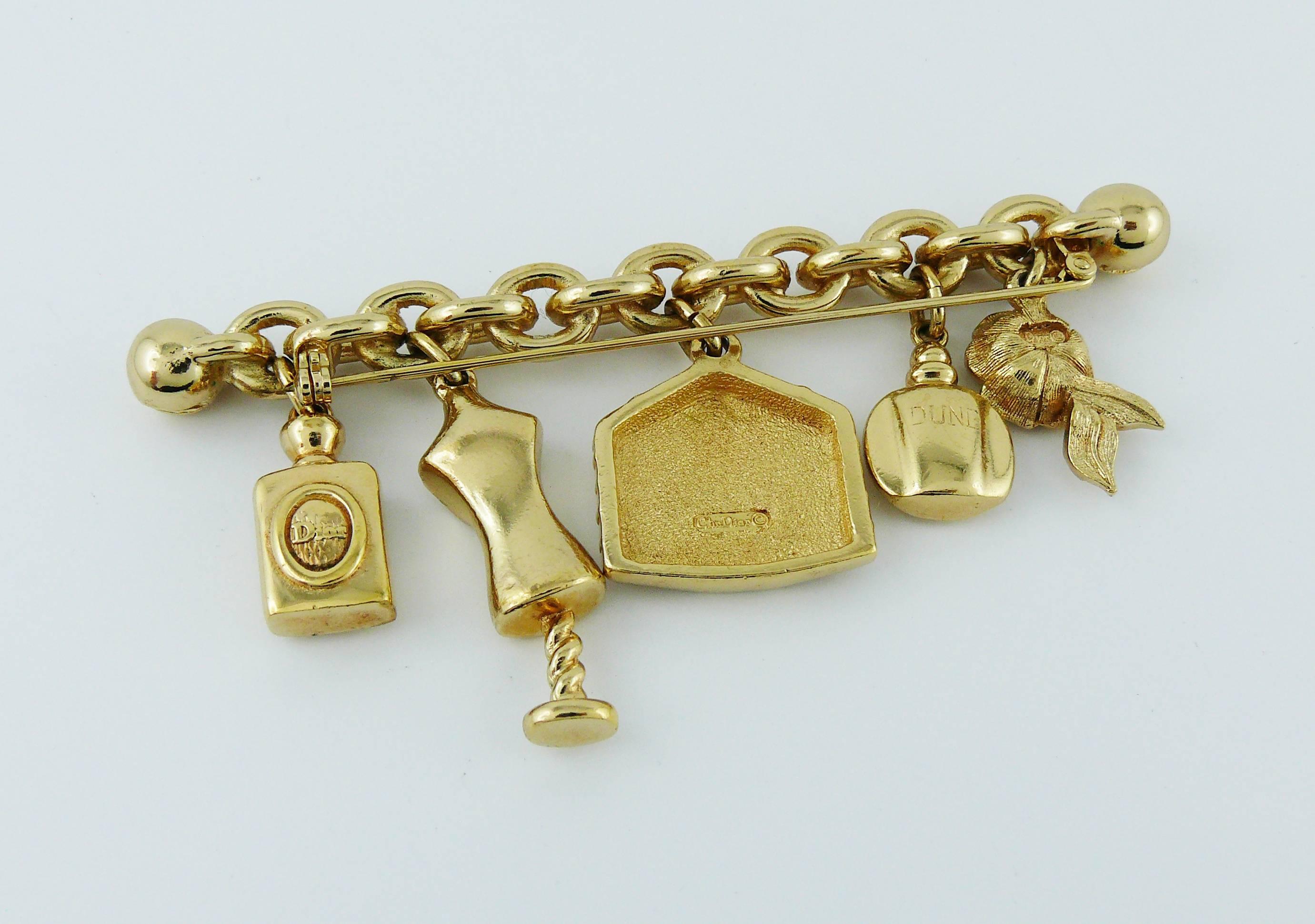 Christian Dior Gold Toned Brooch with Charms 1