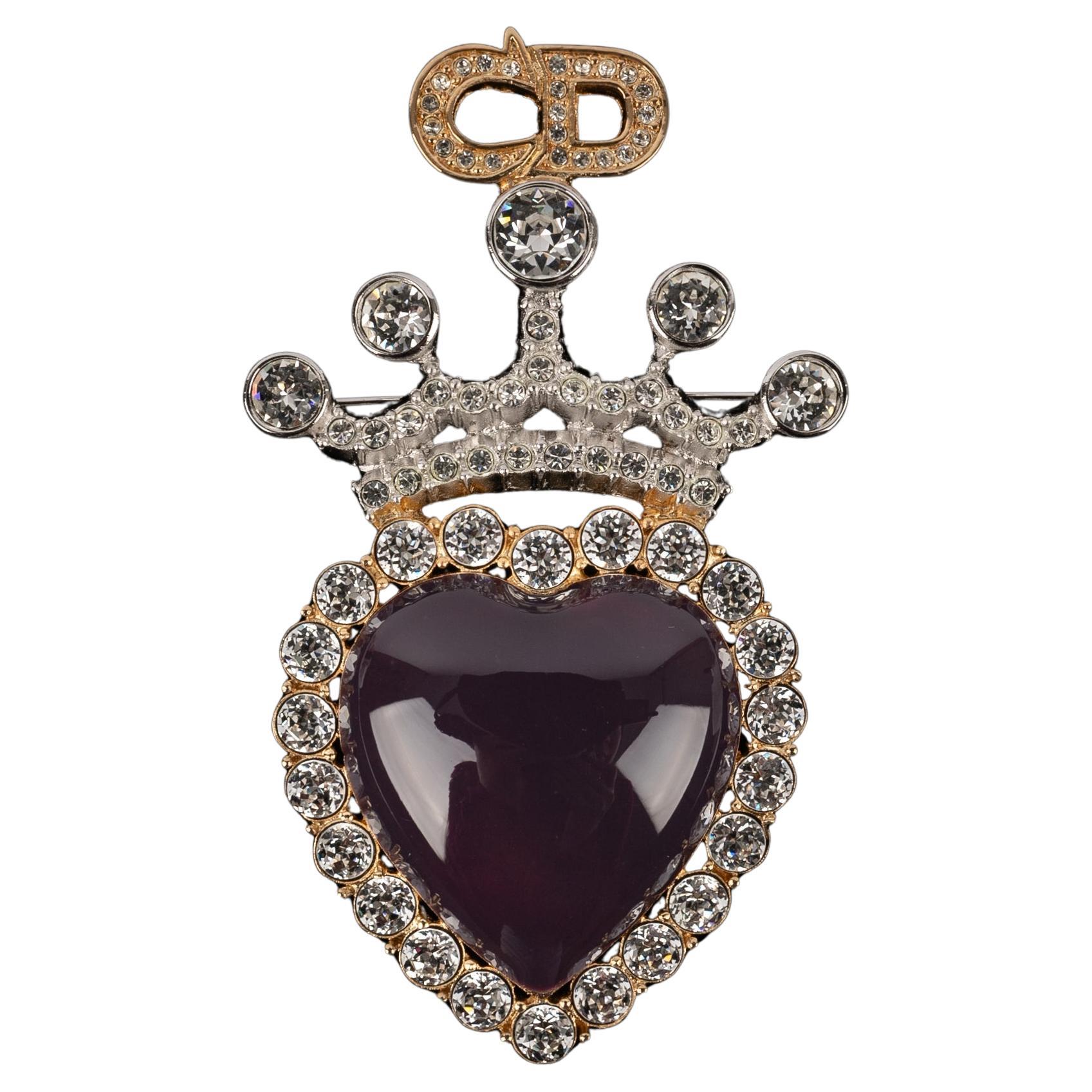 Spilla 'Ex-voto' in metallo dorato e argentato di Christian Dior