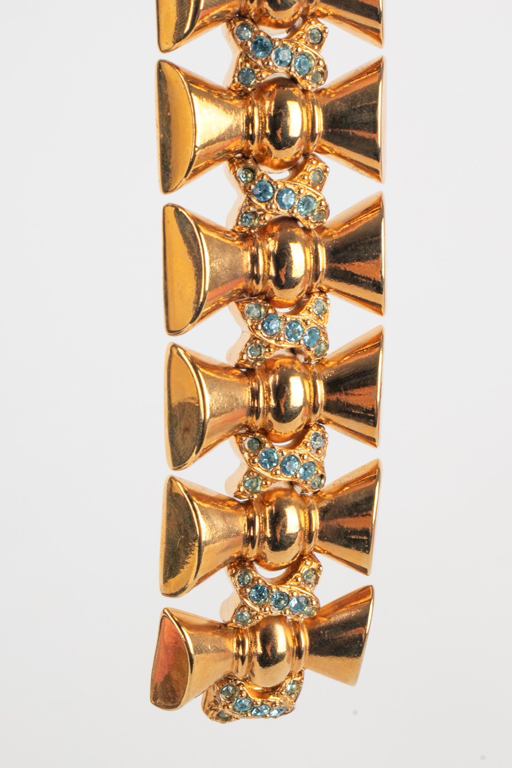 Christian Dior Golden Metal Articulated Bracelet with Blue Rhinestones In Excellent Condition For Sale In SAINT-OUEN-SUR-SEINE, FR