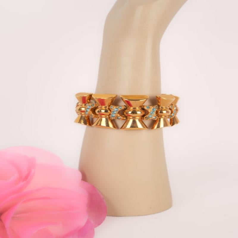 Christian Dior Golden Metal Articulated Bracelet with Blue Rhinestones For Sale 2