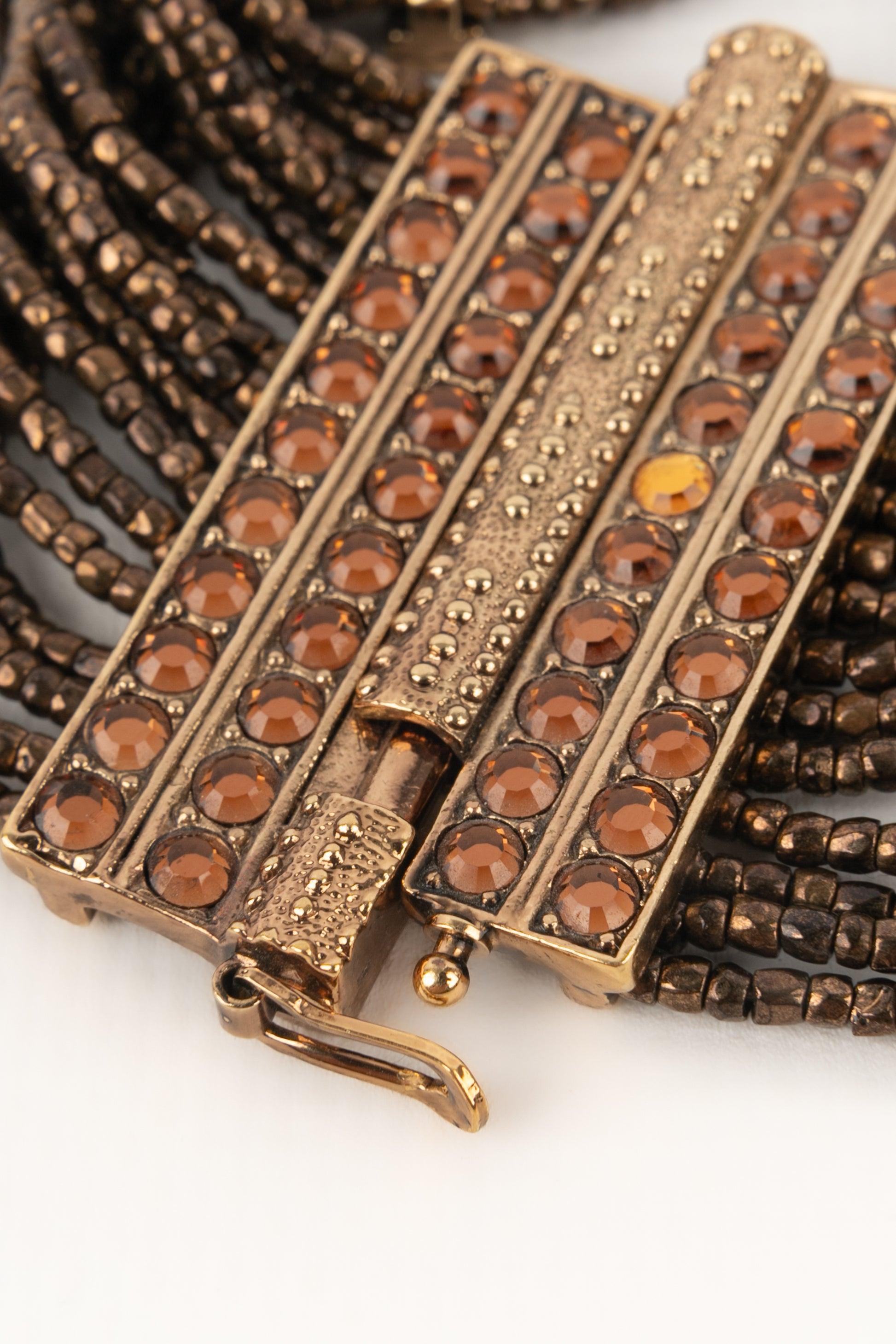 Christian Dior Golden Metal Bracelet with Orange Rhinestones For Sale 1