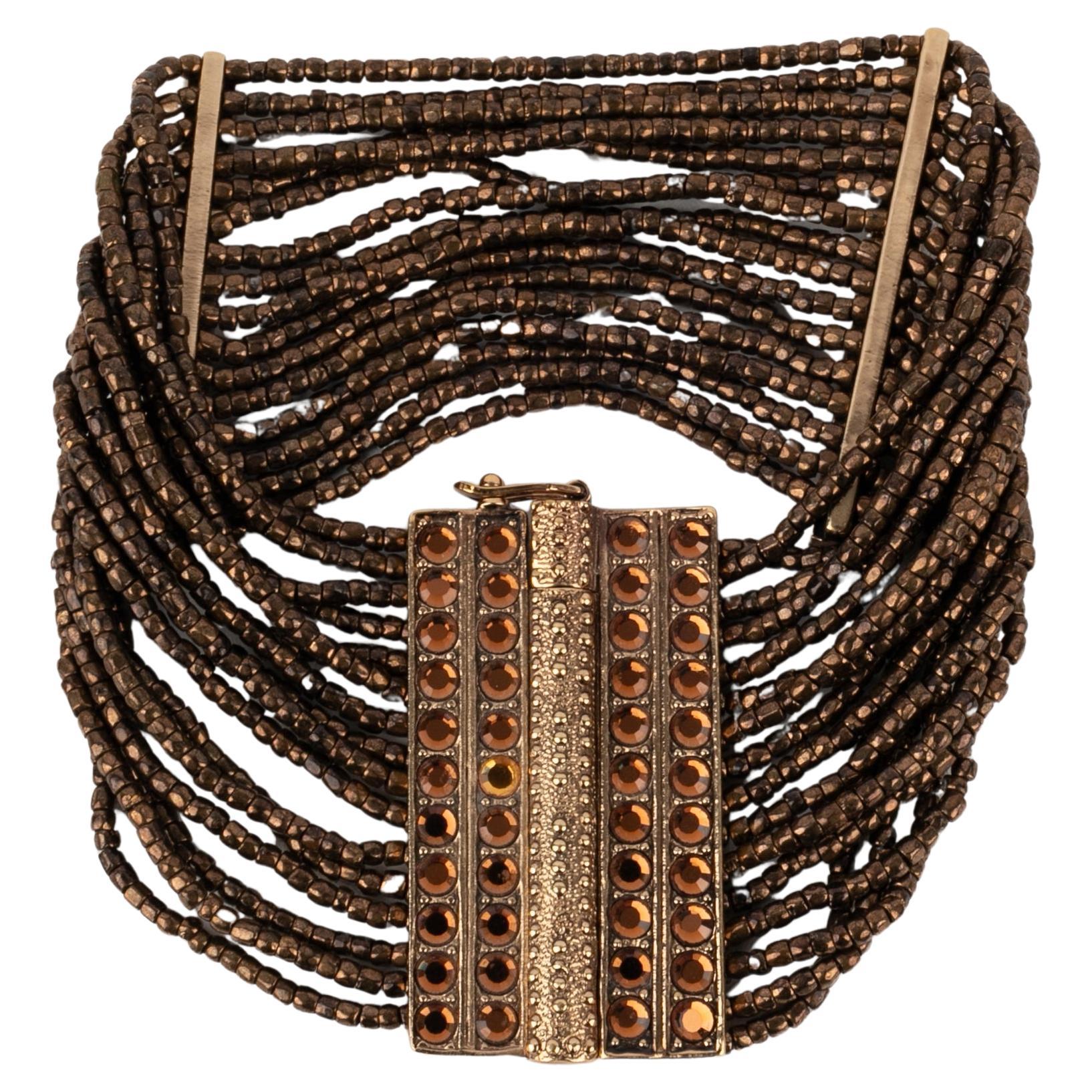 Christian Dior Golden Metal Bracelet with Orange Rhinestones For Sale