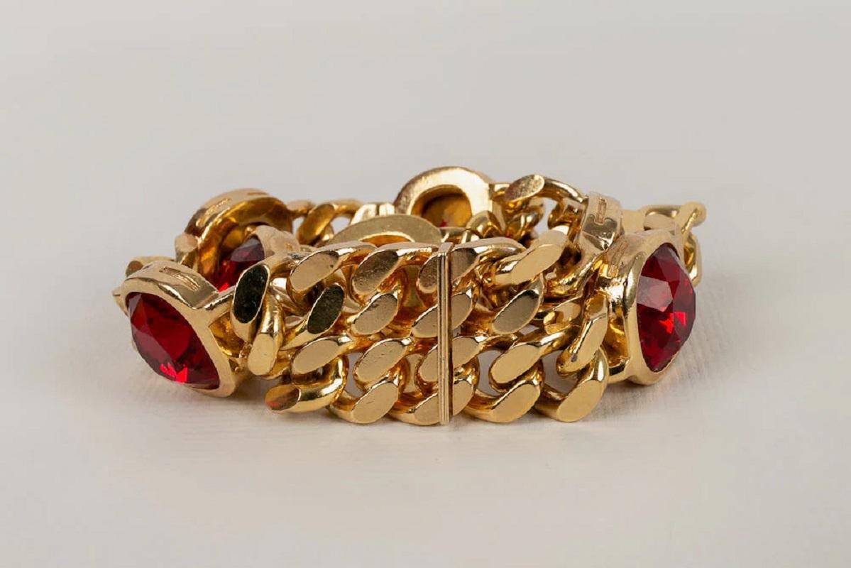 Women's Christian Dior Golden Metal Bracelet with Red Rhinestones For Sale