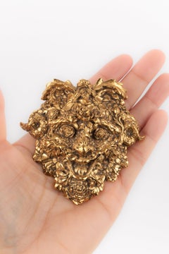Christian Dior Broche pendentif en métal doré