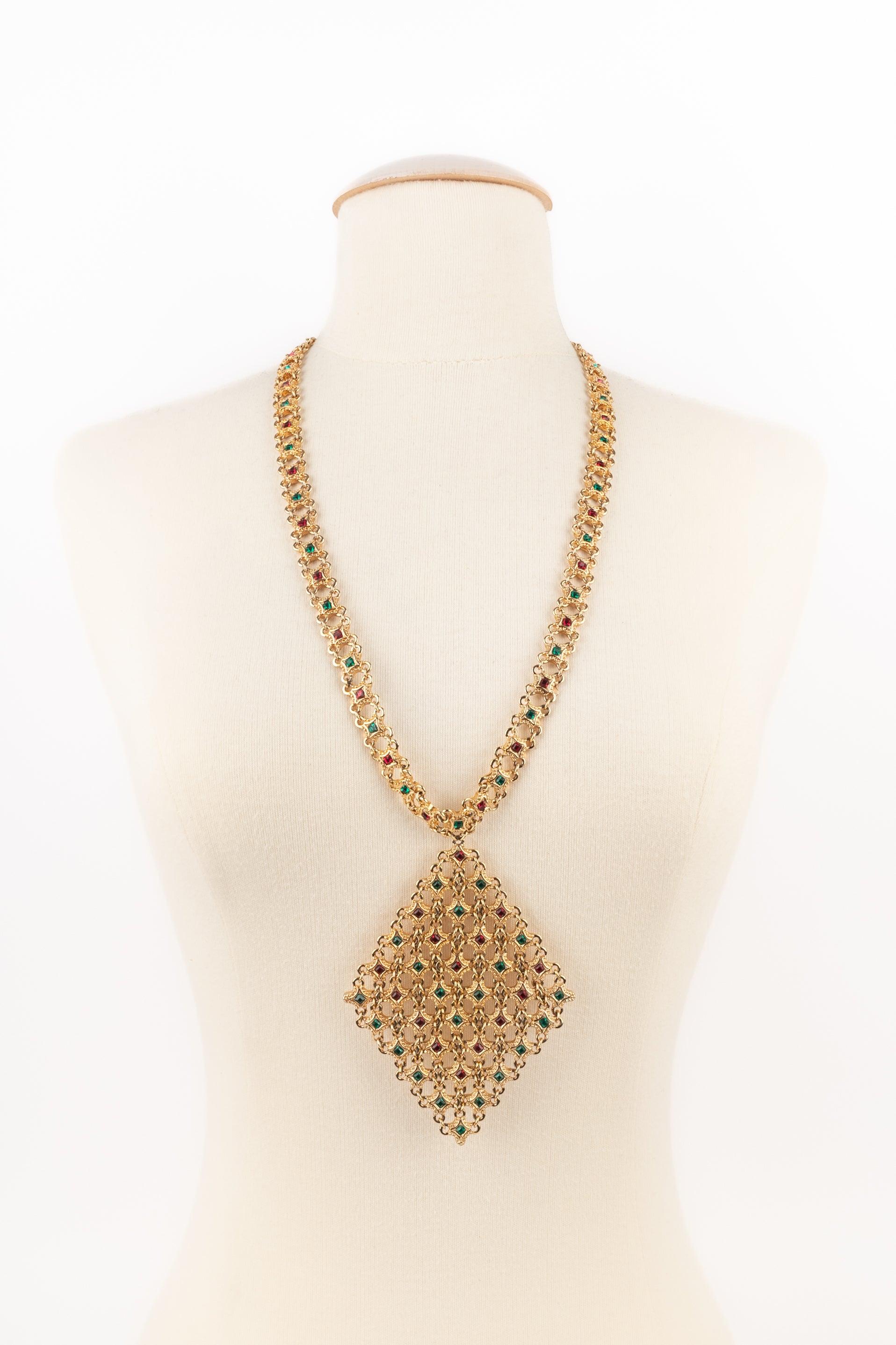 Dior - Golden metal openwork necklace with rhinestones.

Additional information:
Condition: Very good condition
Dimensions: Length: from 71 cm to 76 cm

Seller Reference: BC57