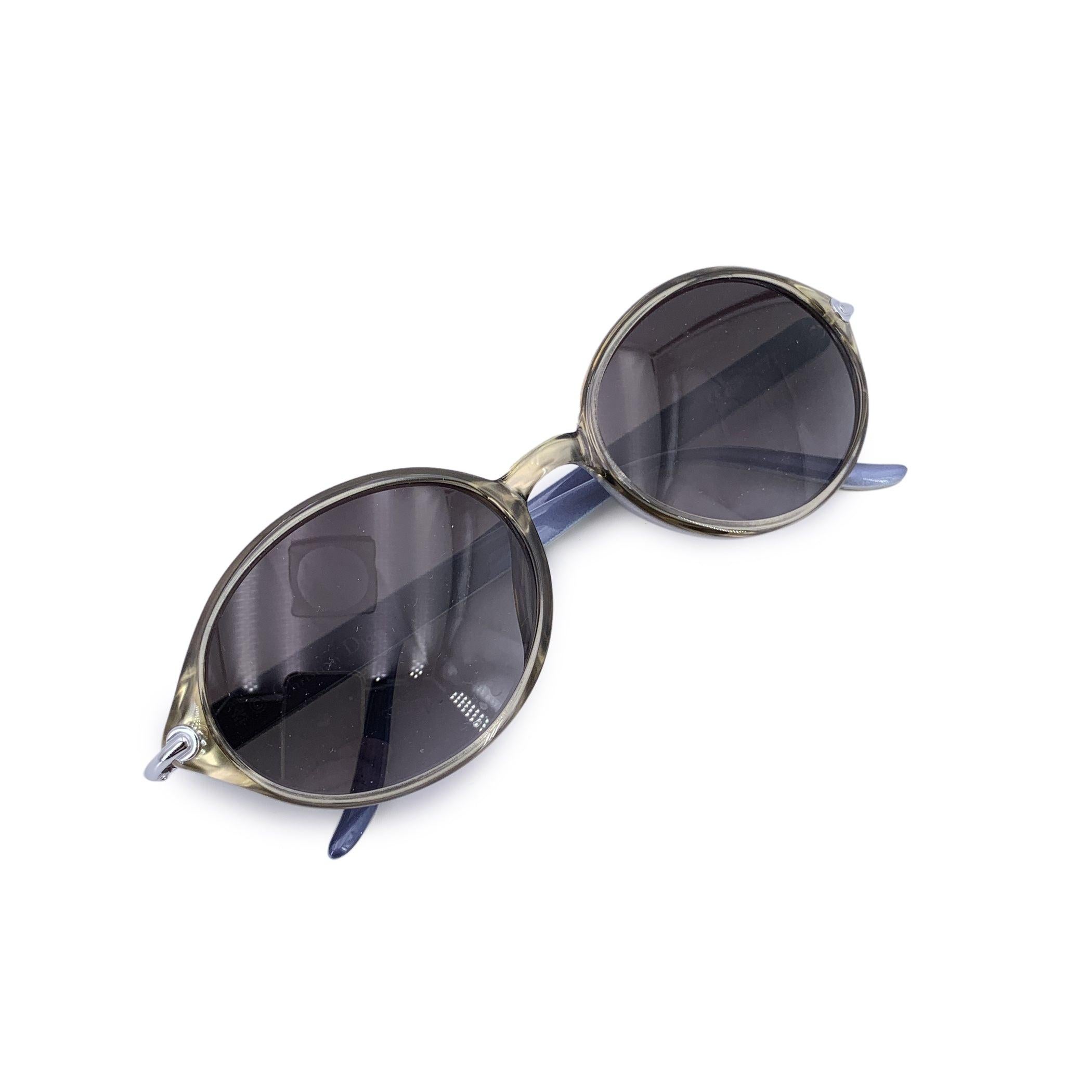 Beautiful oval Christian Dior sunglasses, crafted in Austria during the golden age of fashion innovation. This model, CD 3004, embodies the signature elegance and forward-thinking design that defined Dior's eyewear line during that era. With their