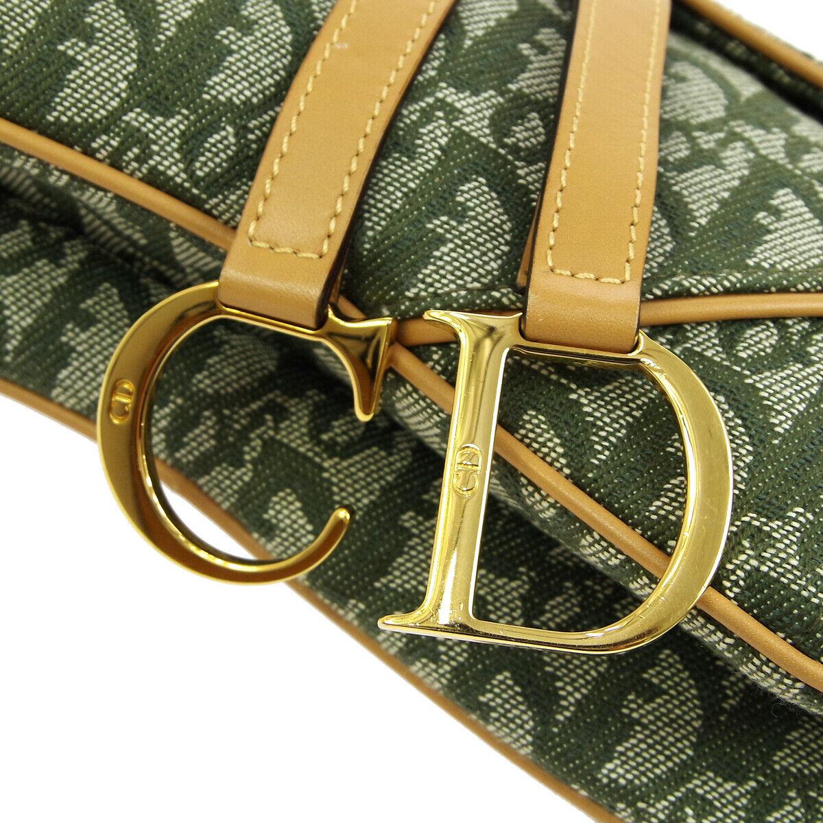 Christian Dior Green Monogram Cognac Leather 'CD' Logo Charm Saddle Shoulder Bag

Monogram canvas
Leather trim
Gold tone hardware
Velcro closure
Woven lining
Made in Italy
Shoulder strap drop 6.5