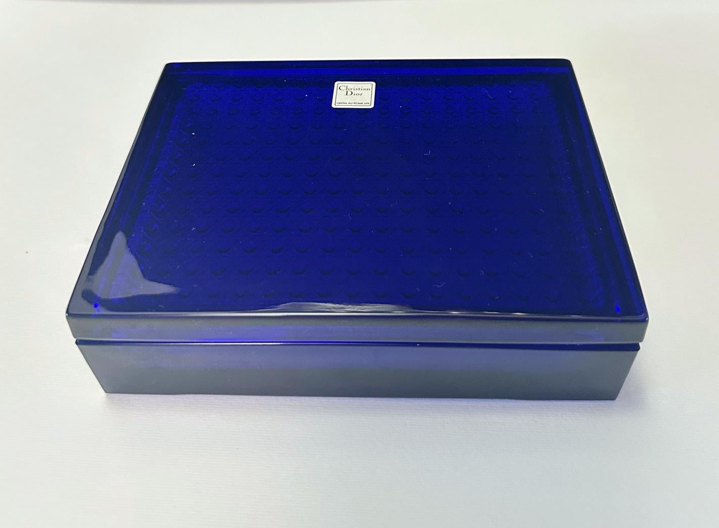Christian Dior cobalt blue rectangular lead glass crystal box with etched texture inside the lid / made in France
Original label on the glass / comes in original box
Length: 6.5 inches / Width: 5 inches / Height: 1.5 inches
1 available in stock in
