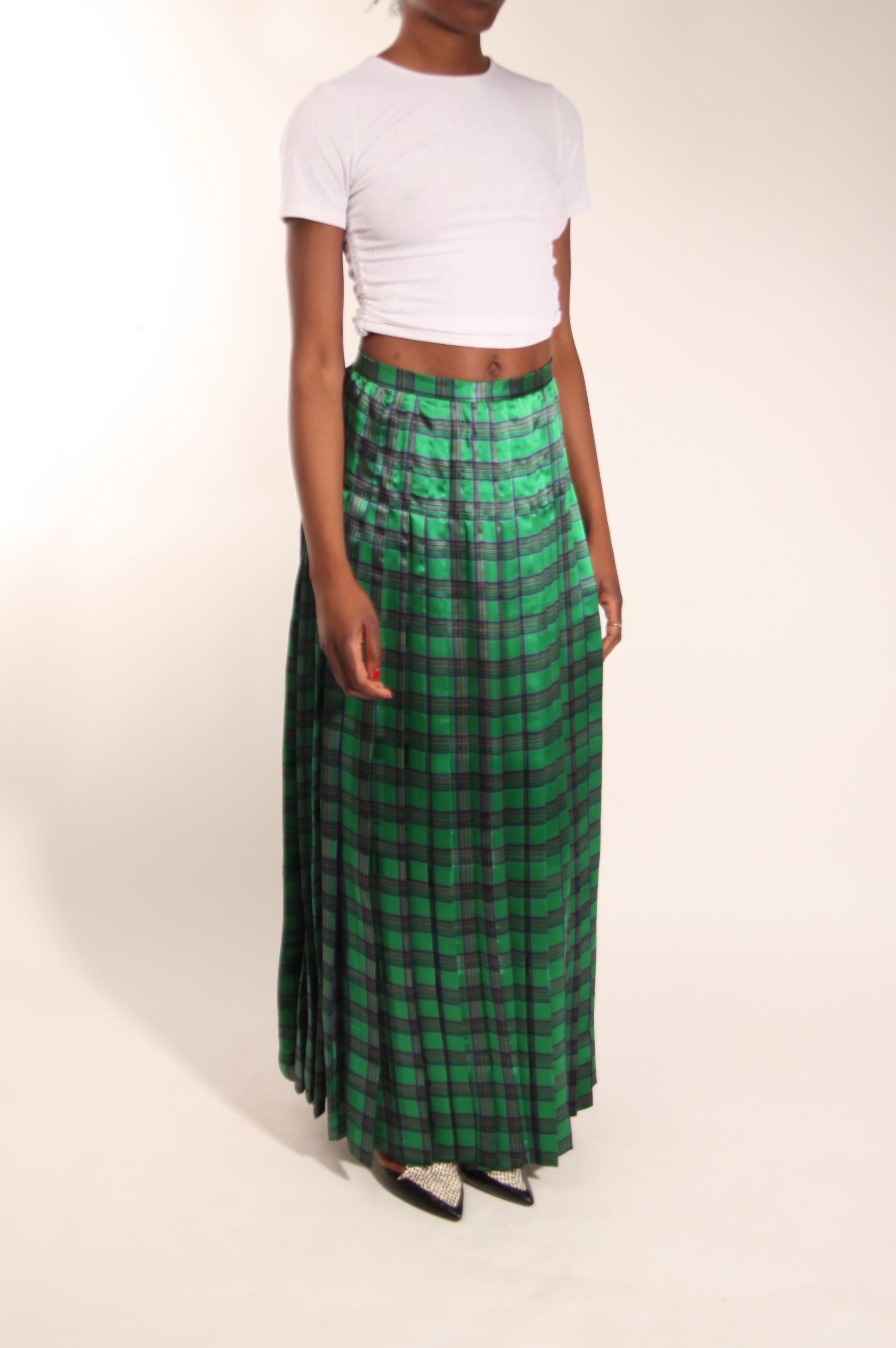 
The tartan print has been celebrated in fashion for it symbolises tradition and refined style. This rare and timeless 1970s silk evening skirt by Dior embodies the luxury and elegance intrinsically connected with the luxury French house.
 Each