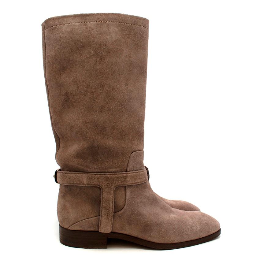 Christian Dior Greige Suede Harness Flat Boots

- Made of soft suede 
- Classic mid length style 
- Slight western inspired details 
- CD gold tone hardware to the back 
- Harness detail 
- Slightly squared toes 
- Soft leather lining 
- Timeless