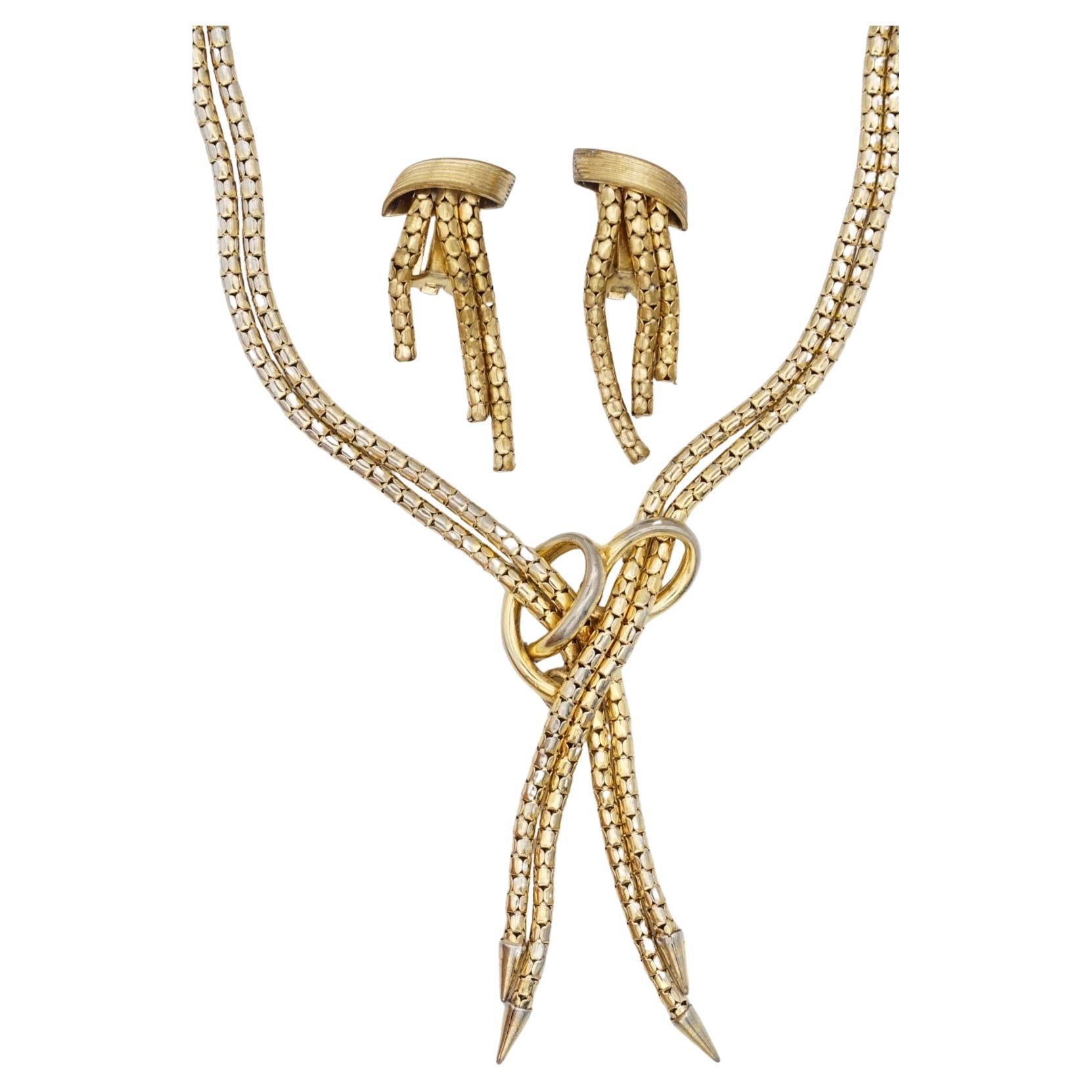 Christian Dior GROSSE 1958 Vintage Double Strands Layers Cross Knot Arrow Y Tassel Modernist Rope Necklace Earrings jewellery Set

Good condition. Scratches or color loss, still very good to wear. Very beautiful costume jewellery set. 100% Genuine.