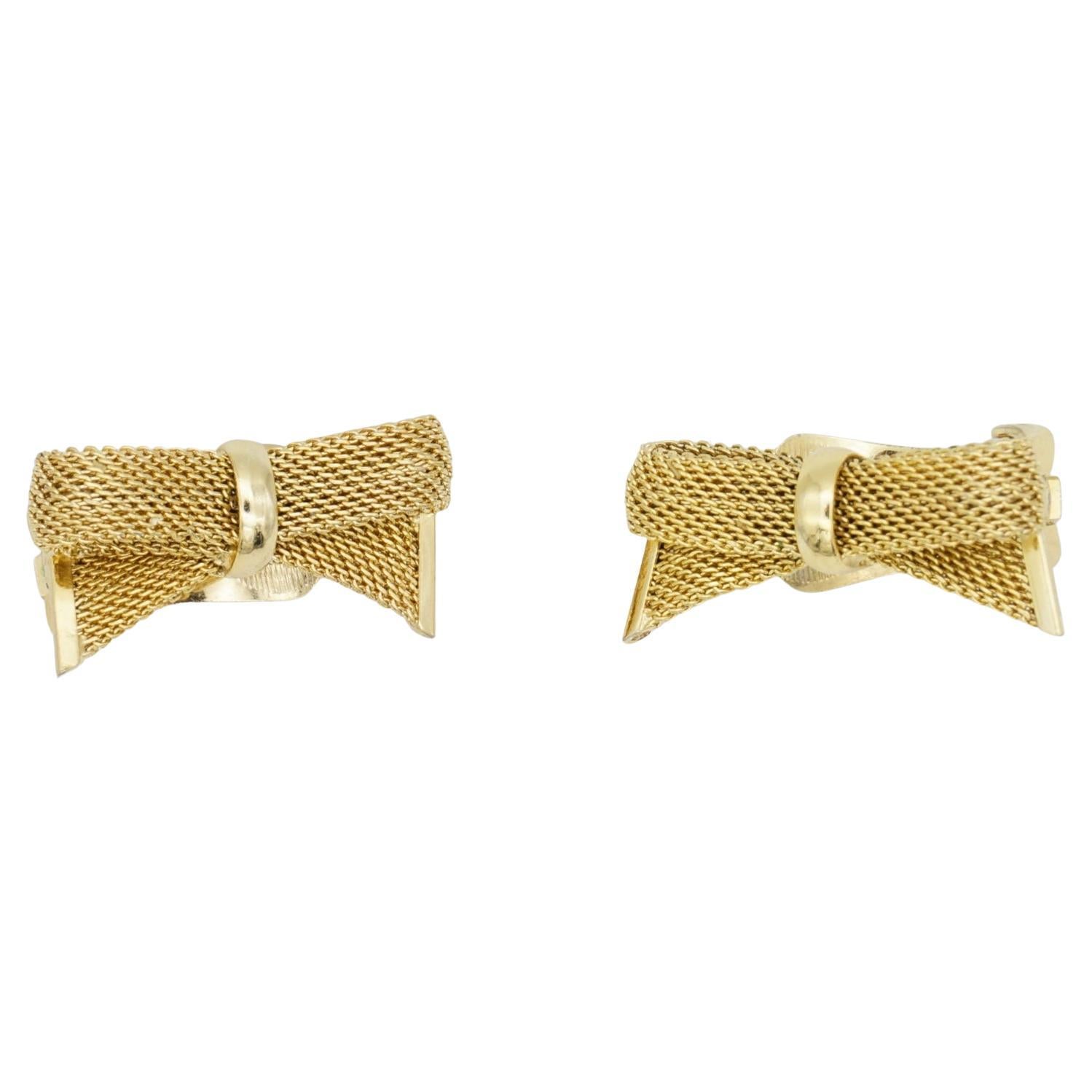 Christian Dior GROSSE Vintage 1958 Knot Bow Butterfly Ribbon Mesh Woven Clip Earrings, Gold Plated

Very excellent condition. 100% genuine. 

A very beautiful pair of clip on earrings, signed at the back.

Material: Gold plated metal.

Size: 2.8*1.5