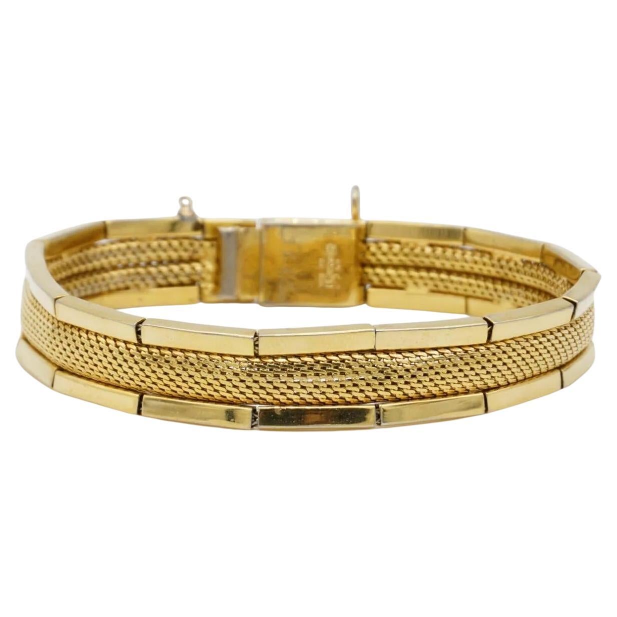 Christian Dior GROSSE 1959 Vintage Unisex Woven Mesh Link Ridged Double Hinged Cuff Bracelet, Gold Tone

Very good condition, light scratches and colour loss, the small link part is lost, but still very fasten and good to wear.

A very beautiful
