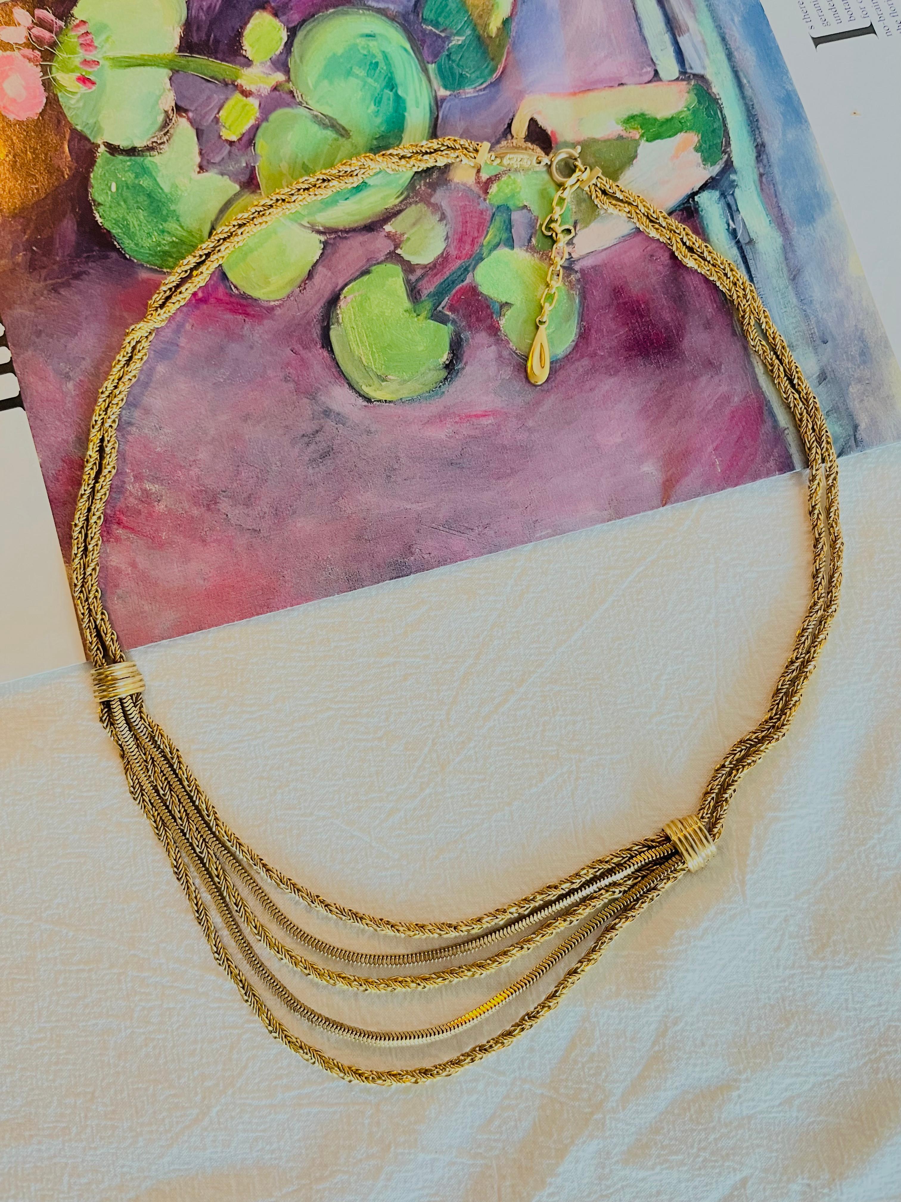 Christian Dior GROSSE 1961 Vintage Large Five 5 Strands Double Layers Tassel Rope Long Necklace, Gold Plated

Very good condition. Very light scratches or colour loss, barely noticeable. 100% Genuine. 

Signed at clasp. This is oversize one. Much