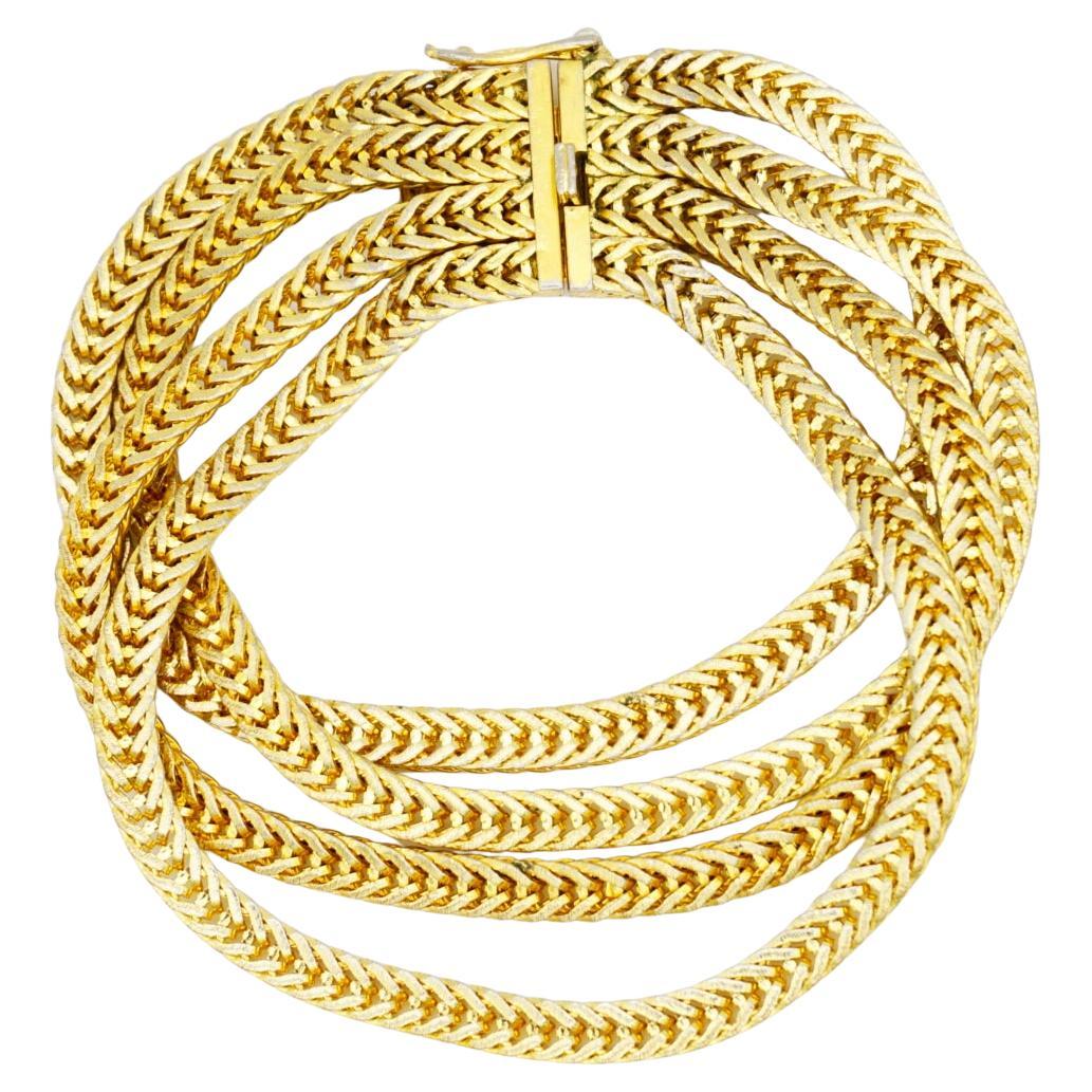 Christian Dior GROSSE 1963 Vintage Unisex Four 4 Strands Layers Wheat Chain Rope Snake Modernist Cuff Bracelet, Gold Tone

Very good condition. Light scratches or colour loss, barely noticeable. 100% Genuine.

Signed at the back. Very rare to find.
