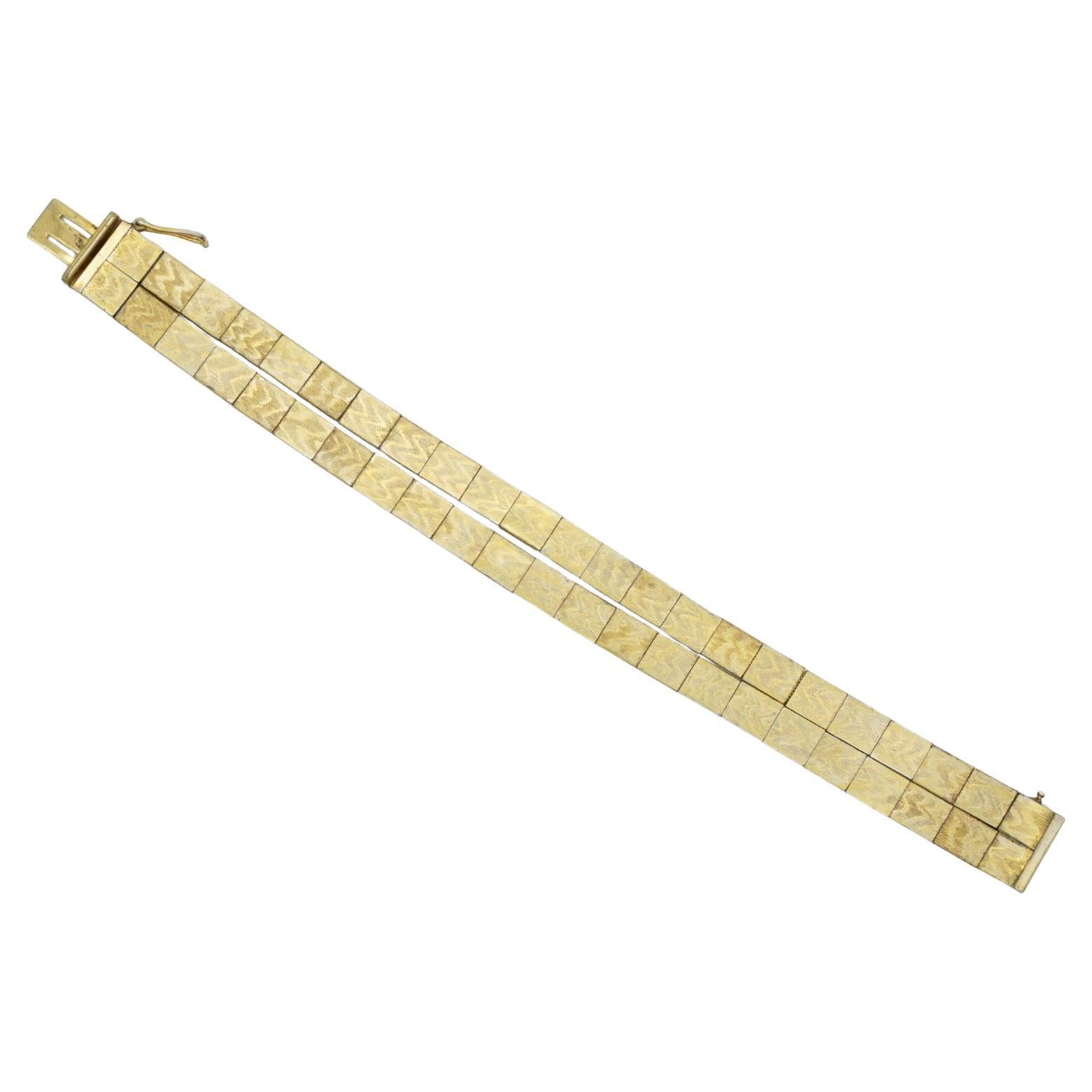 Christian Dior GROSSE 1963 Vintage Unisex Pulsera modernista de eslabones de cubo enrollado con doble bisagra, tono dorado

Buen estado, algunos ligeros arañazos y pérdida de color, pero se puede llevar. 100% original.

Una pulsera muy singular,