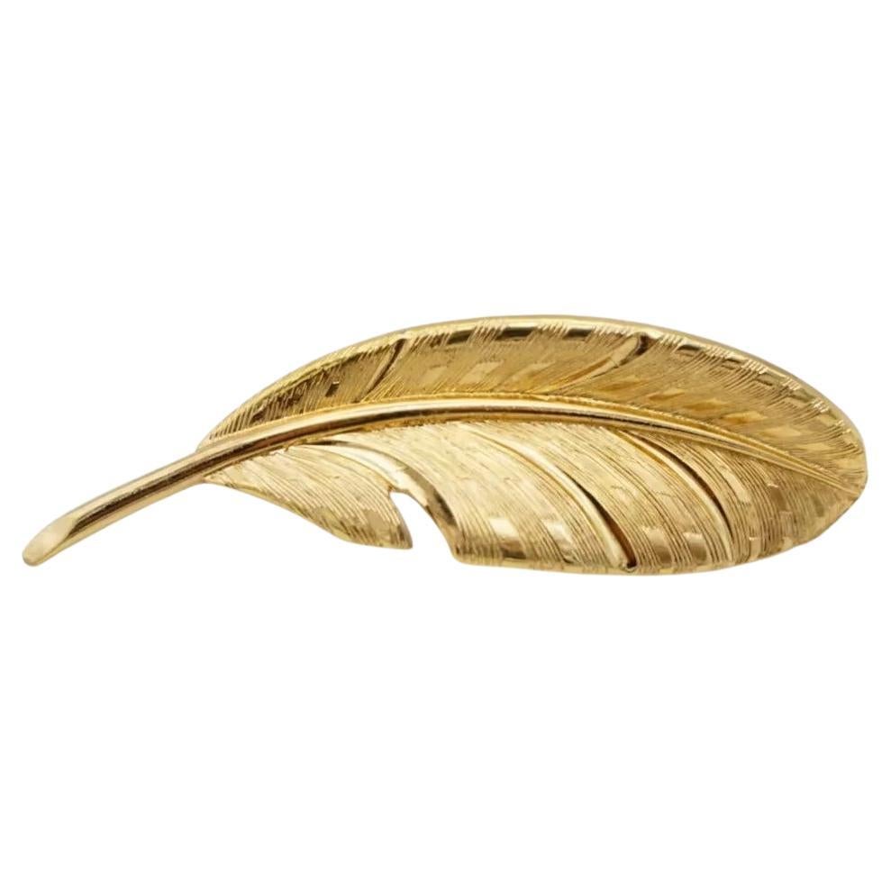 Christian Dior GROSSE 1963 Vintage Vivid Modernist Long Leaf Palm Brooch, Gold Tone

Very good condition. 100% Genuine. A unique piece. 

This is gold plated stylised brooch. Safety-catch pin closure, signed on the back.

Material: Gold plated