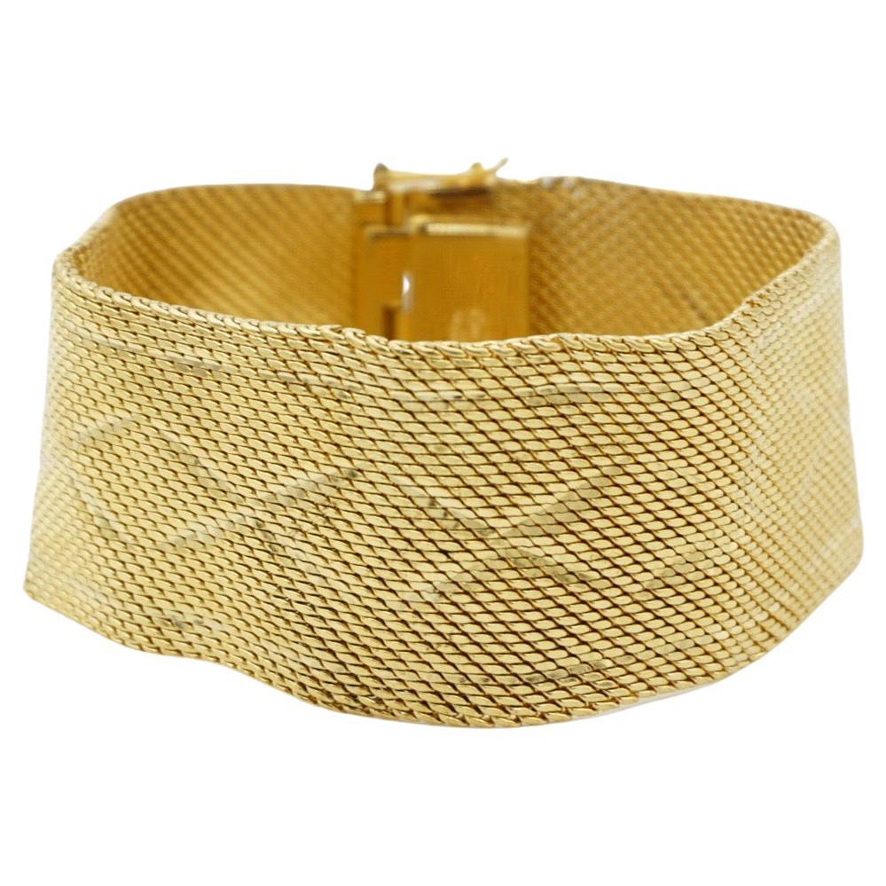 Christian Dior GROSSE 1966 Unisex Cross Diamond Woven Mesh Modernist Statement Cuff Bracelet, Gold Tone

A very beautiful bracelet by Chr. DIOR GROSSE, signed at the back.

Very good condition. Not very paralleled since the bracelet was made almost