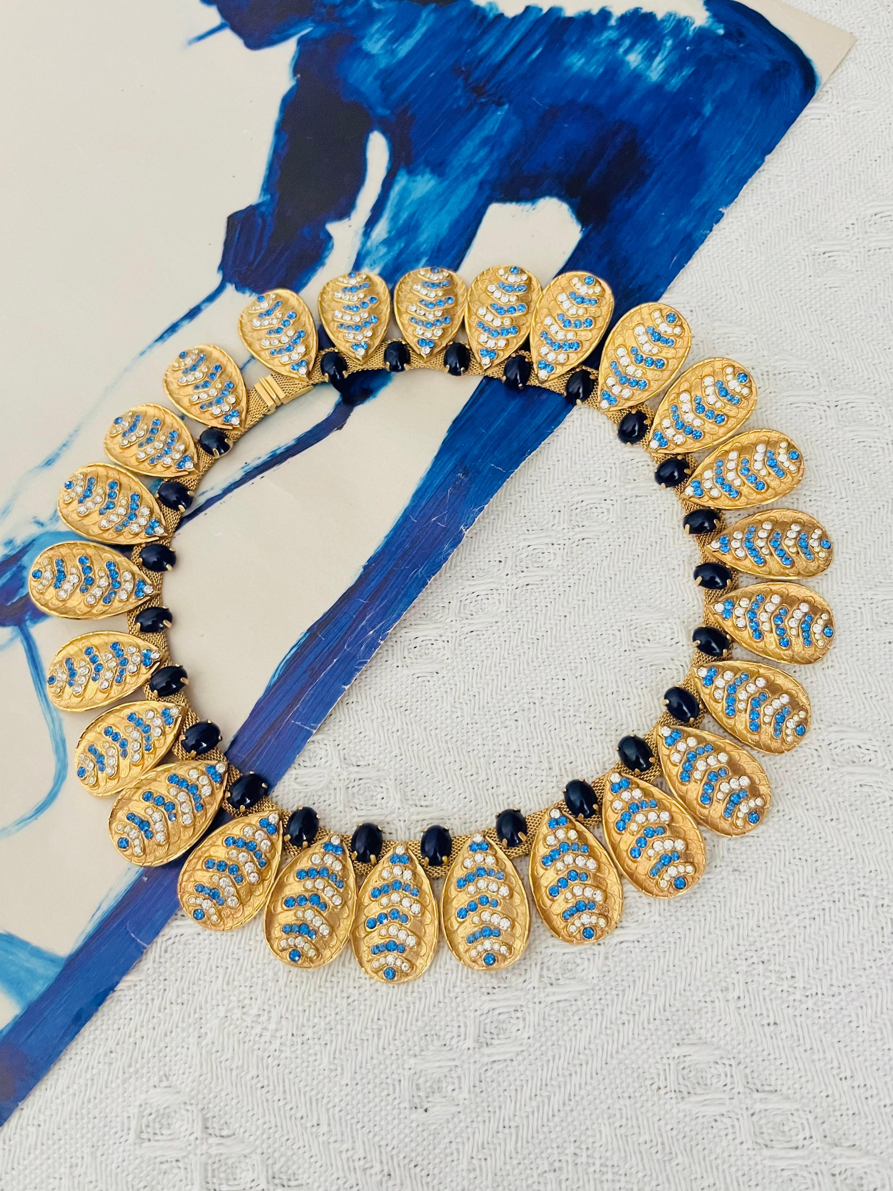 Christian Dior GROSSE 1969 Vintage Luxury Oval Lapis Cabochon Navy Sapphire Blue Clear Crystals Leaf Feather Tear Water Drop Pendants Charms Mesh Chain Statement Chunky Elegant Modernist Necklace, Gold Plated

Very excellent condition. Not any