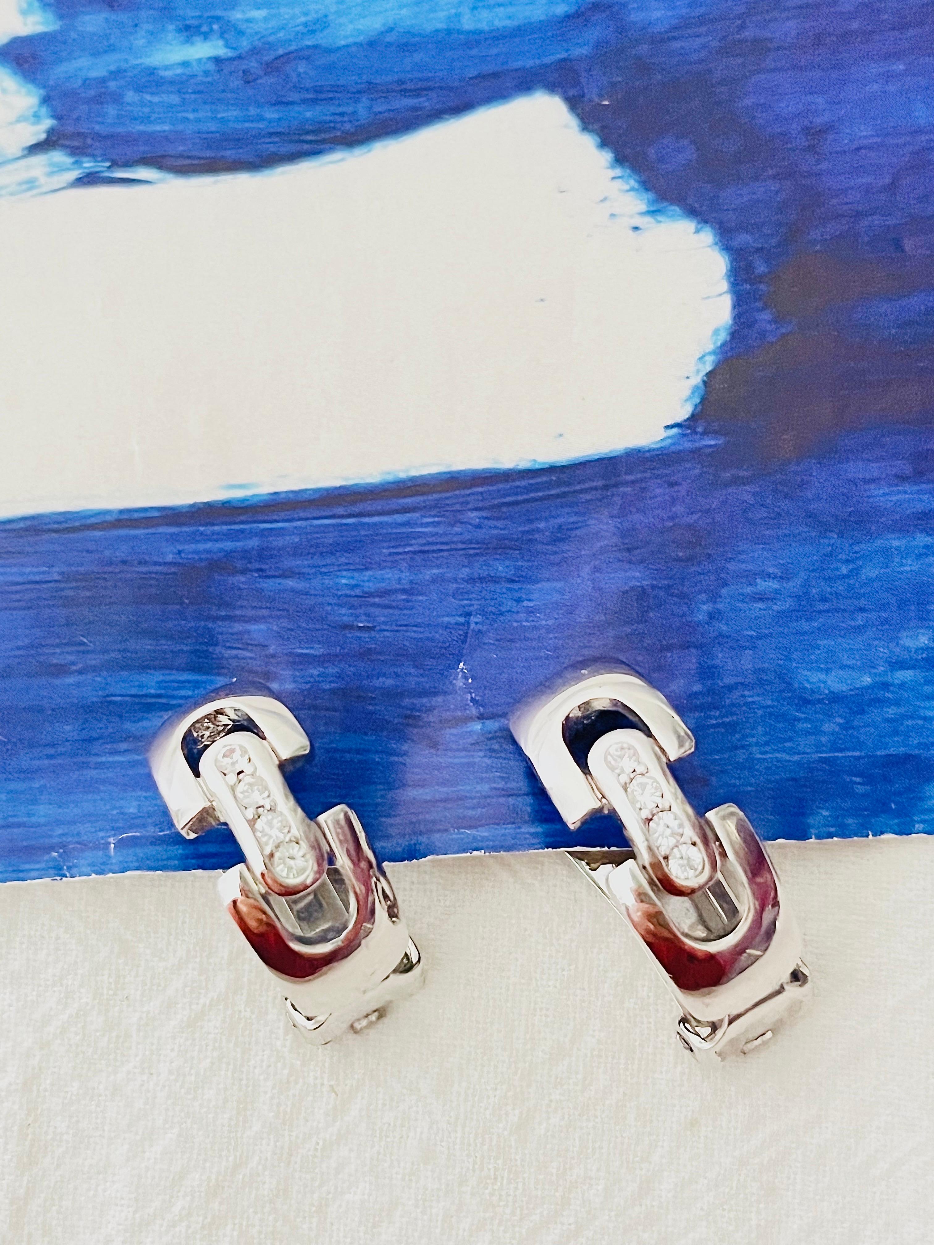 Art Deco Christian Dior GROSSE 1970s Crystals Interlocked Hoop Dome Silver Clip Earrings For Sale