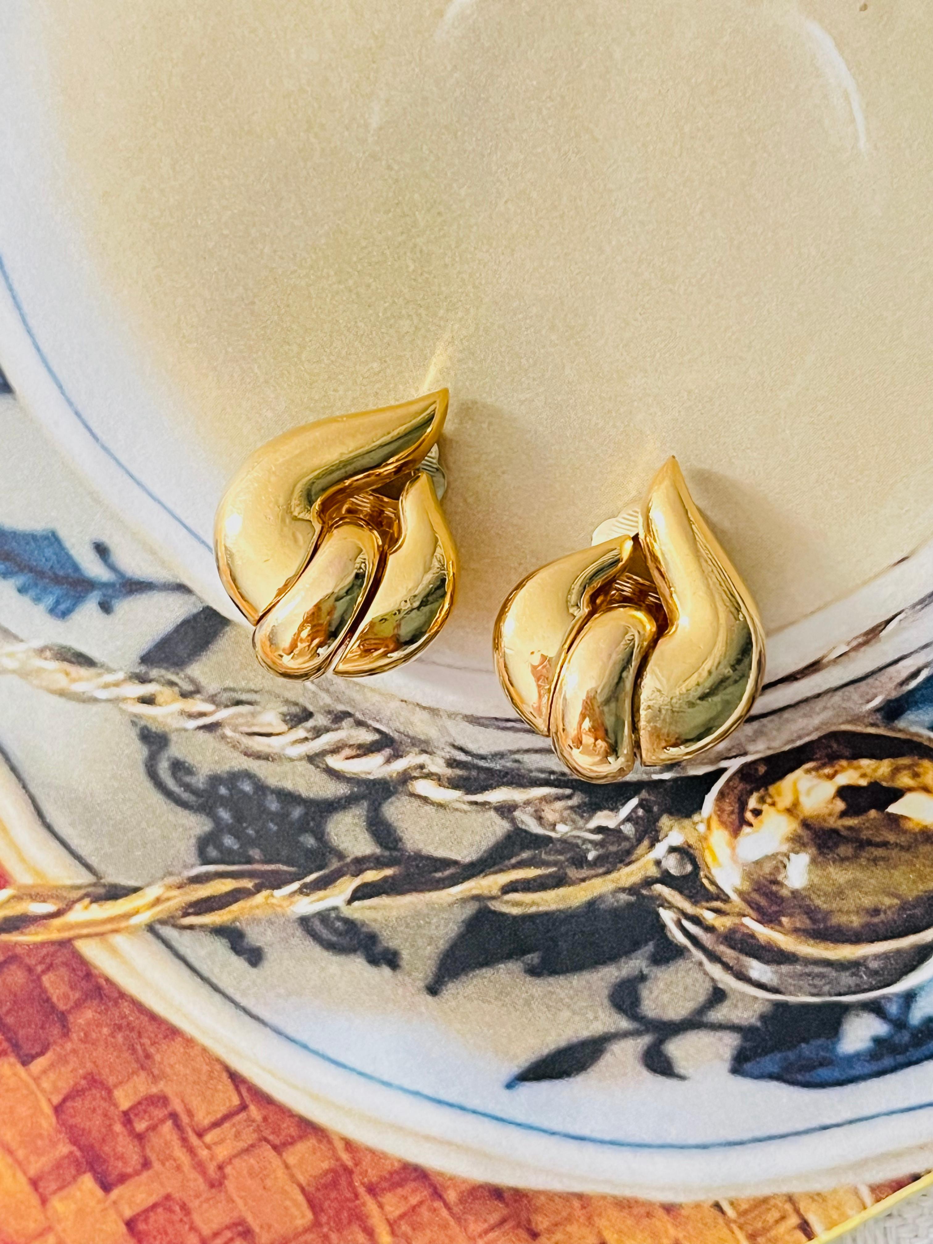 Christian Dior GROSSE Pendientes de lazo con nudo asimétrico de los años 70 Glow Flame Fire Art Decó en venta