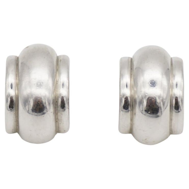 Christian Dior GROSSE 1970s Vintage Unisex Textured Glow Chunky Half Hoop Dome Monderist Clip Earrings, Silver Tone

Very good condition. Vintage and rare to find. 100% Genuine.

A very beautiful pair of clip on earrings, signed at the