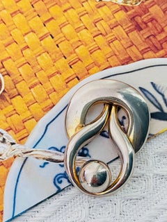 Christian Dior GROSSE 1971 Interlocked Knot Bow Glow Ball Round Twist Pendant