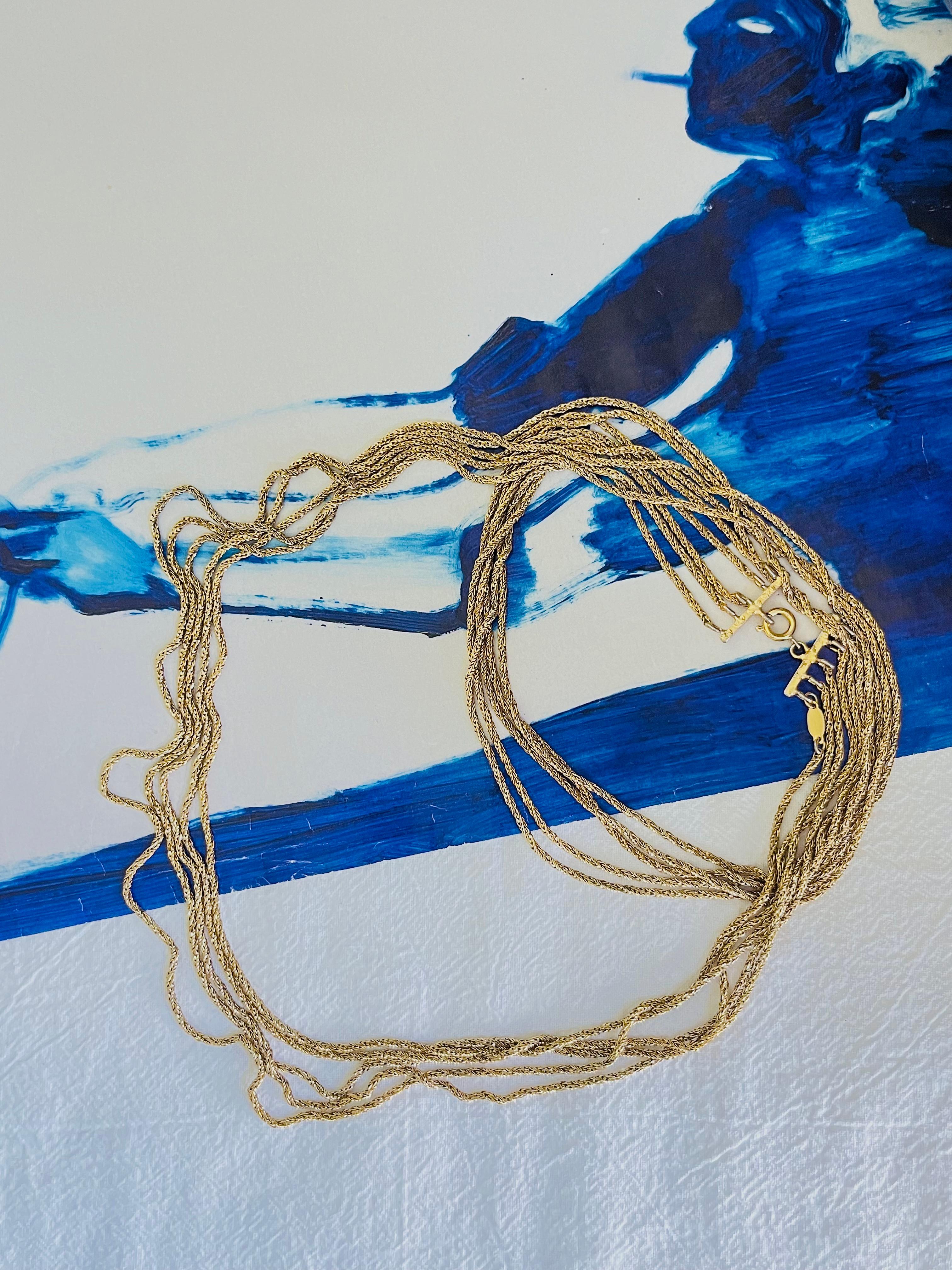 Christian Dior GROSSE 1973 Vintage Unisex Versatile 5 Five Strands Layers Chain Extra Long Necklace, Gold Tone

Very good condition. Light scratches or colour loss.  Can be also worn as a bracelet. 100% genuine.

A unique piece. Signed. 

Size: