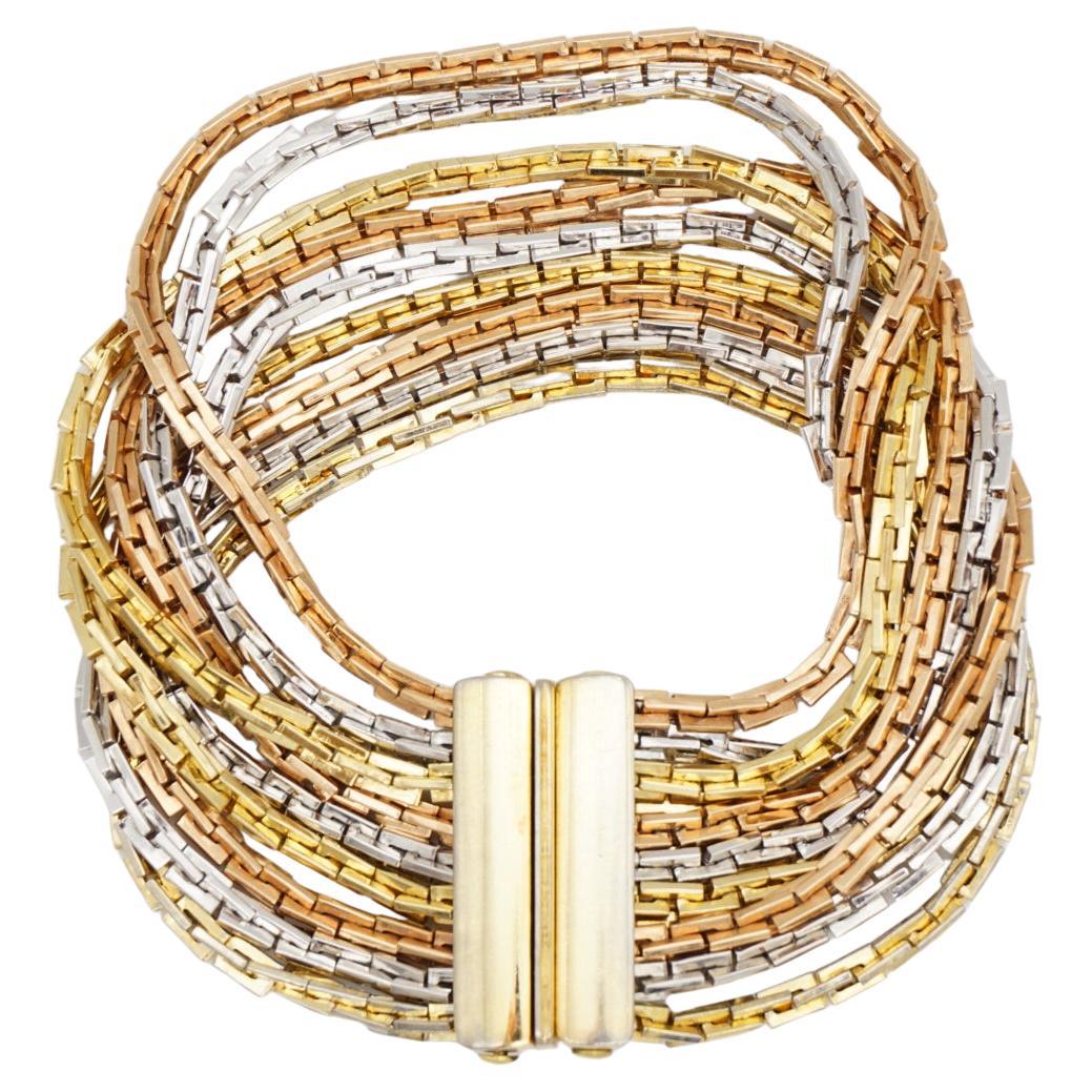 Christian Dior GROSSE 1974 Vintage Unisex Gold Silver Pink Rose 9 Strands Layers Rectangle Box Linked Chain Bracelet

Very good condition. Light scratches or colour loss, barely noticeable. 100% Genuine.
Marked at back. Very rare to find.

Material: