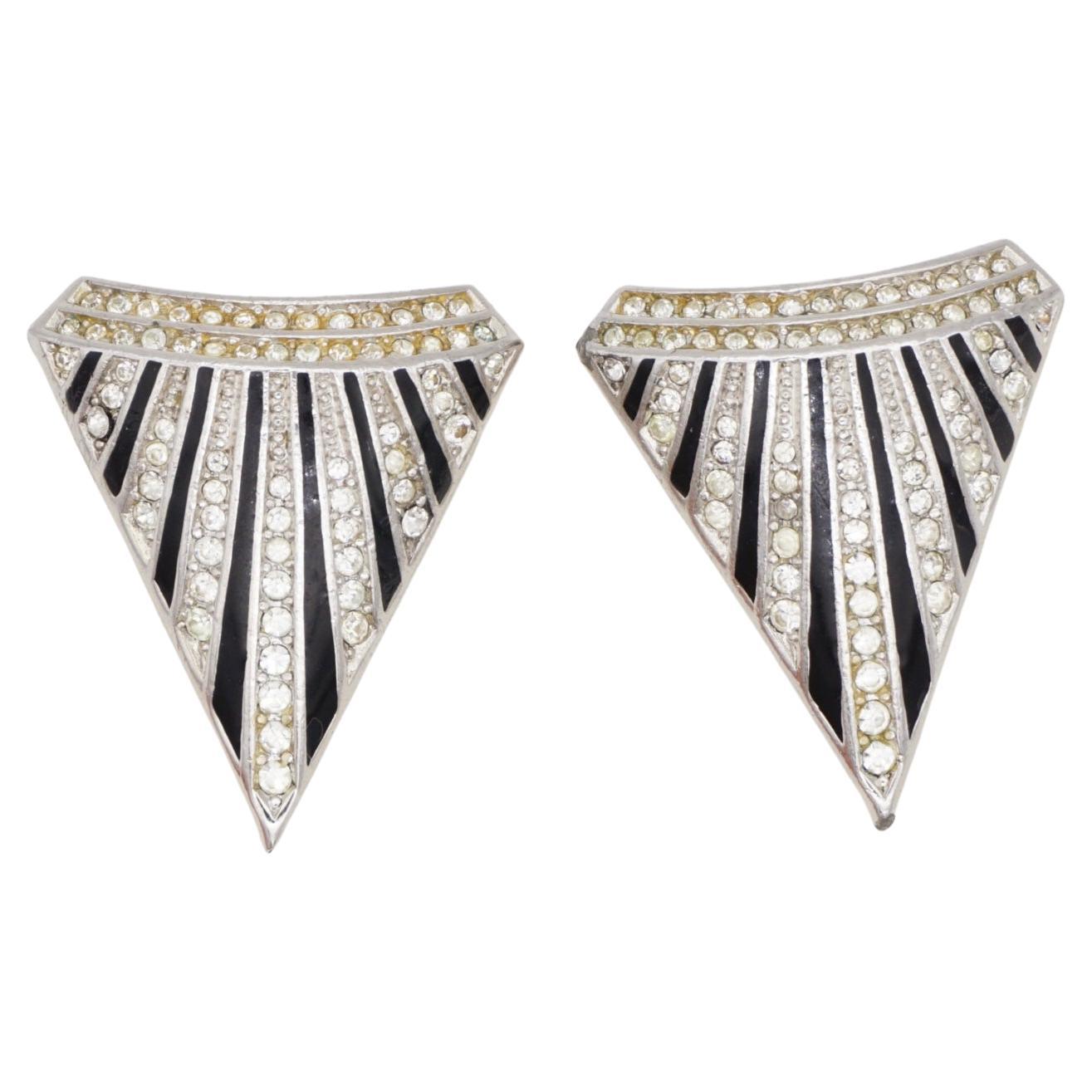 Christian Dior GROSSE 1980s Unisex Massive Large Black Enamel Sparkling Crystals Radiant Sun Burst Triangle Modernist Clip Earrings, Silver Tone

Very good condition. Not any stones lost. Light scratches or colour loss, barely noticeable. 100%