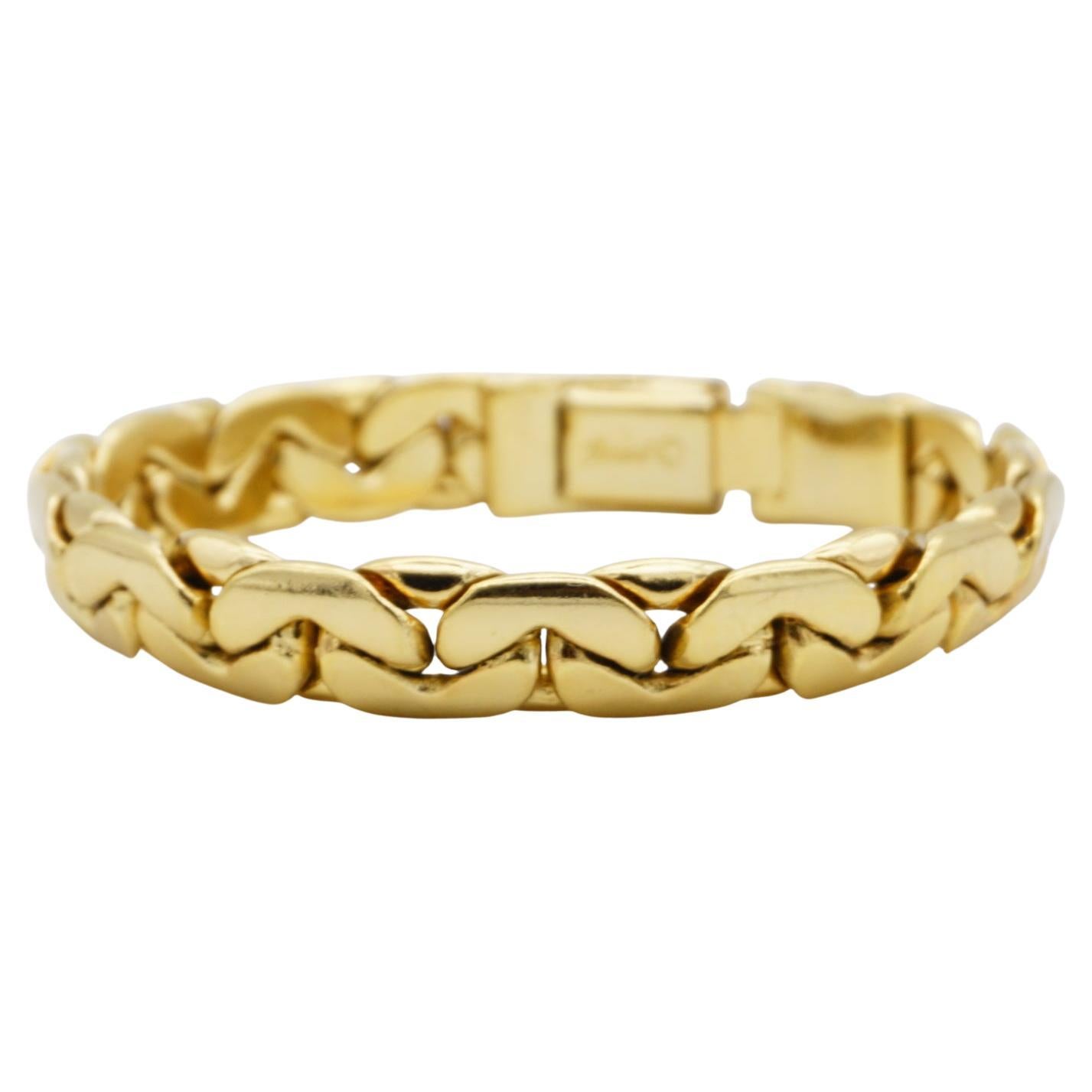 Christian Dior GROSSE 1970s Vintage Unisex Glow Interlinked Hinged Modernist Chunky Chain Bracelet, Gold Tone

Very good condition, maybe light scratches and colour loss. The clasp of press point is shortened, so you need your nail or use other tool