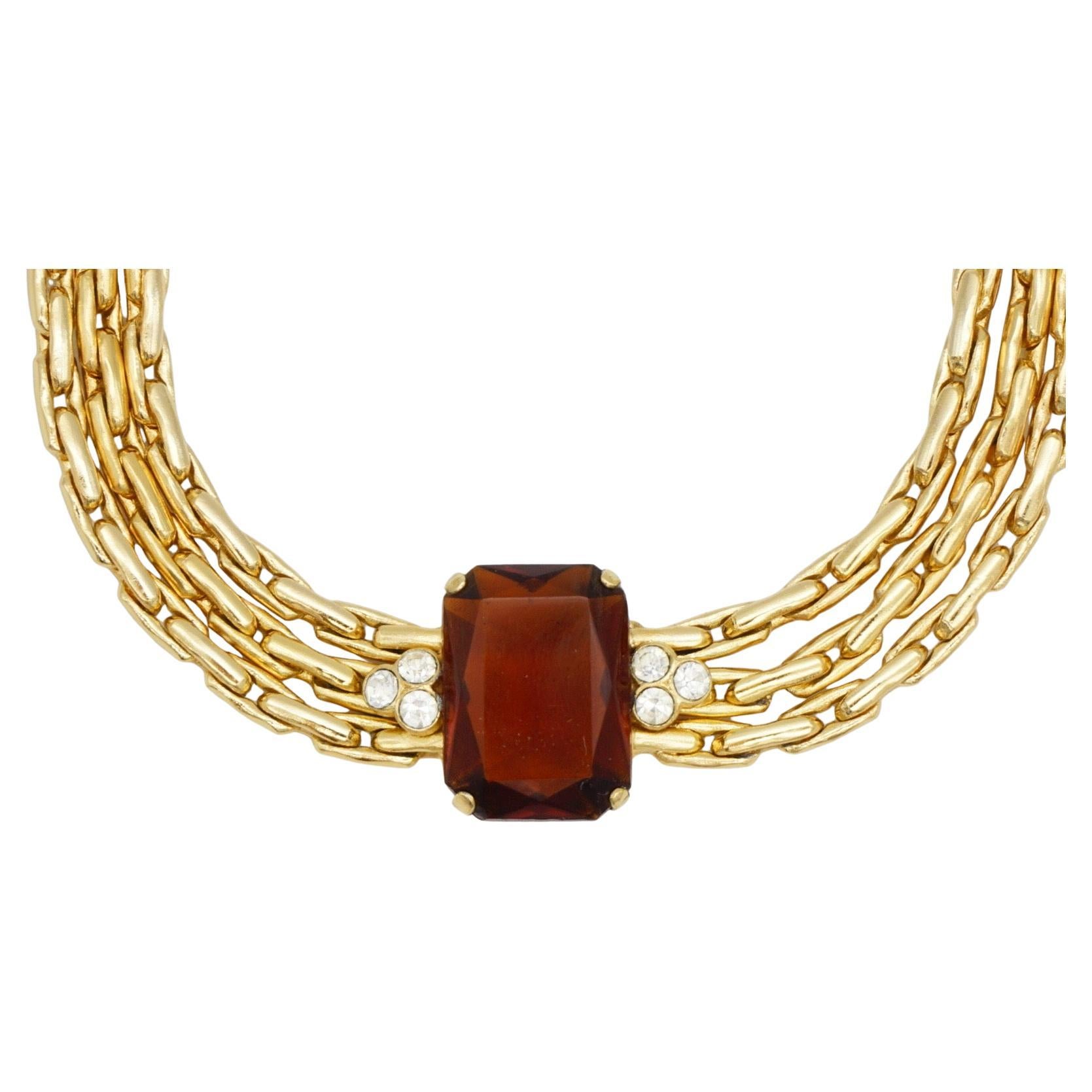 Christian Dior GROSSE 1970s Vintage Octágono Rectángulo Madeira Citrino Amarillo Marrón Cristales Brillantes Trío 3 Filamentos Capas Entrelazadas Elegante Collar Colgante, Tono Oro

Muy buen estado. Quizá ligeros arañazos o pérdida de color, apenas